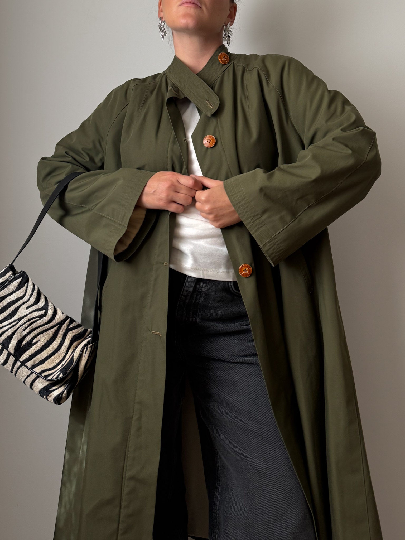 Green quilted-lined trench coat