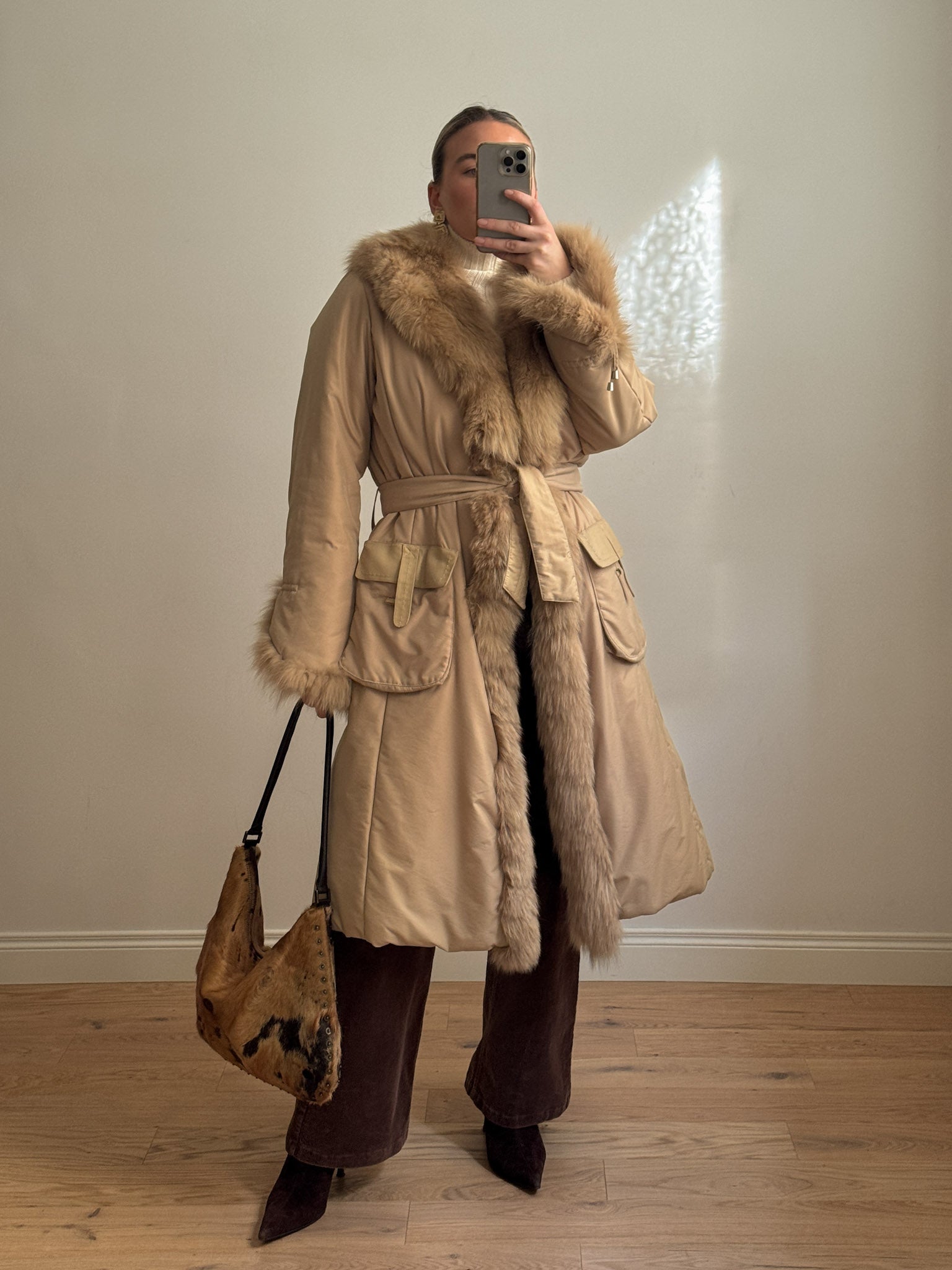 Padded coat with real fur details