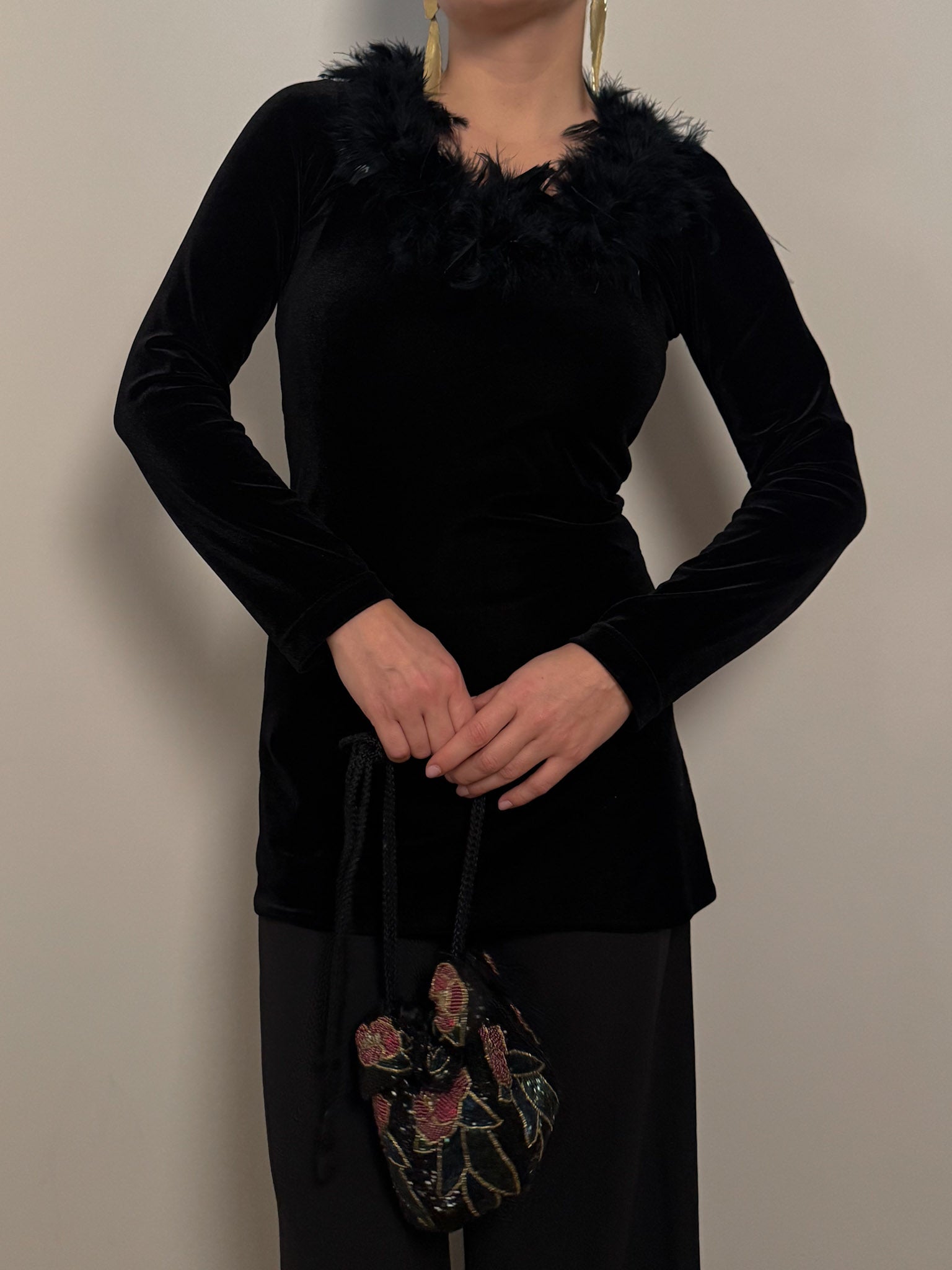 Velvet and feathers black top