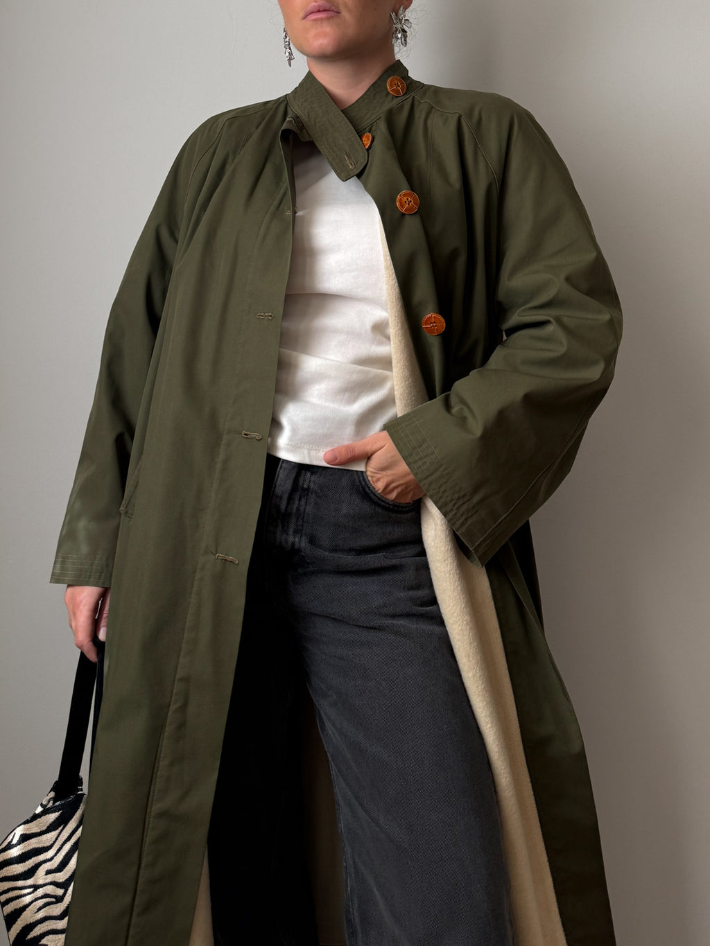 Green quilted-lined trench coat