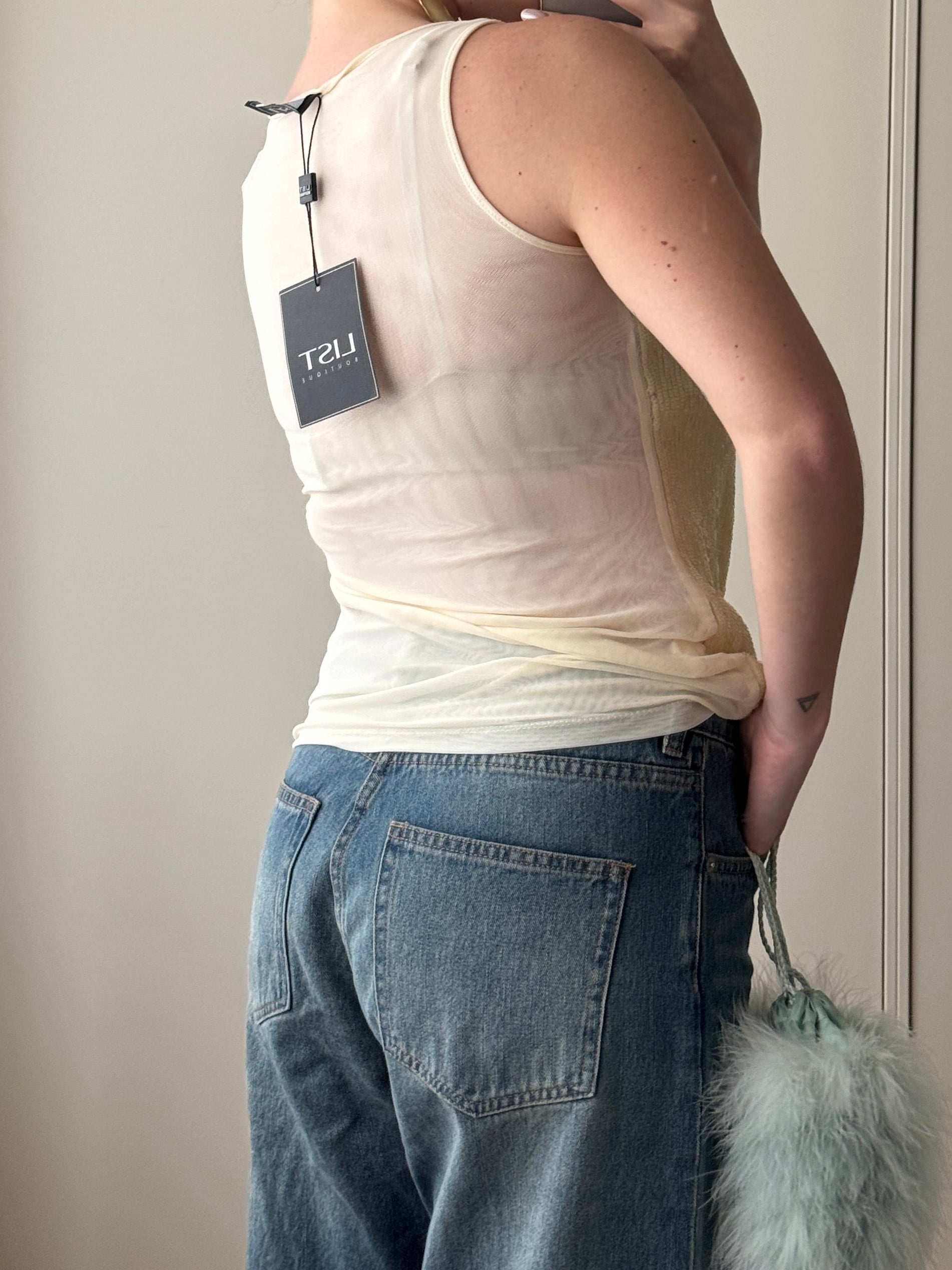 Top con paillettes color burro