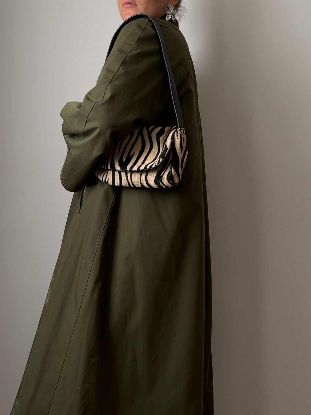 Green quilted-lined trench coat