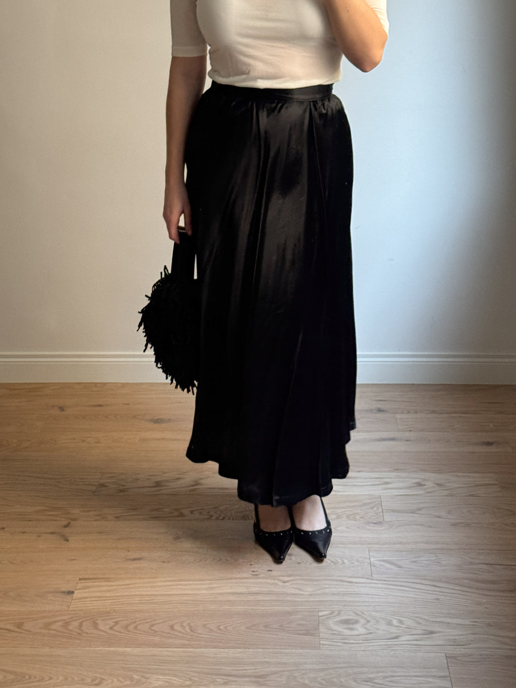 Satin-finish black skirt
