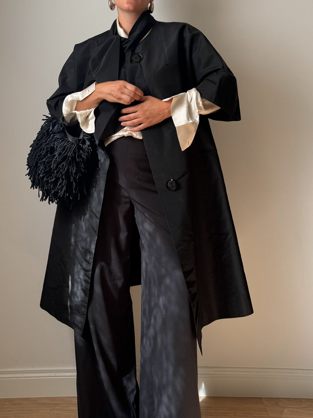 Tailored black dust coat