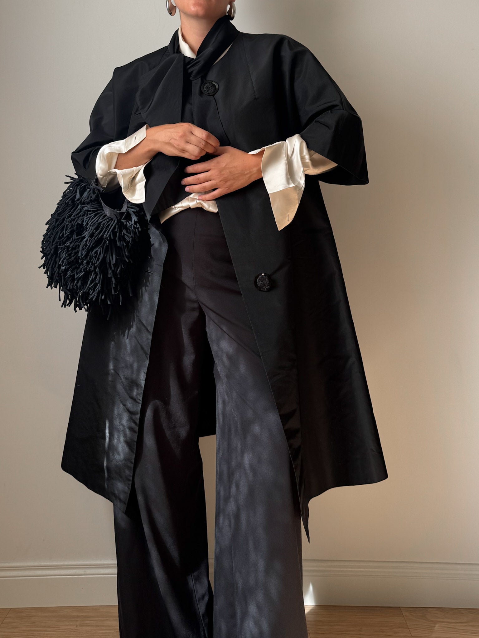 Tailored black dust coat