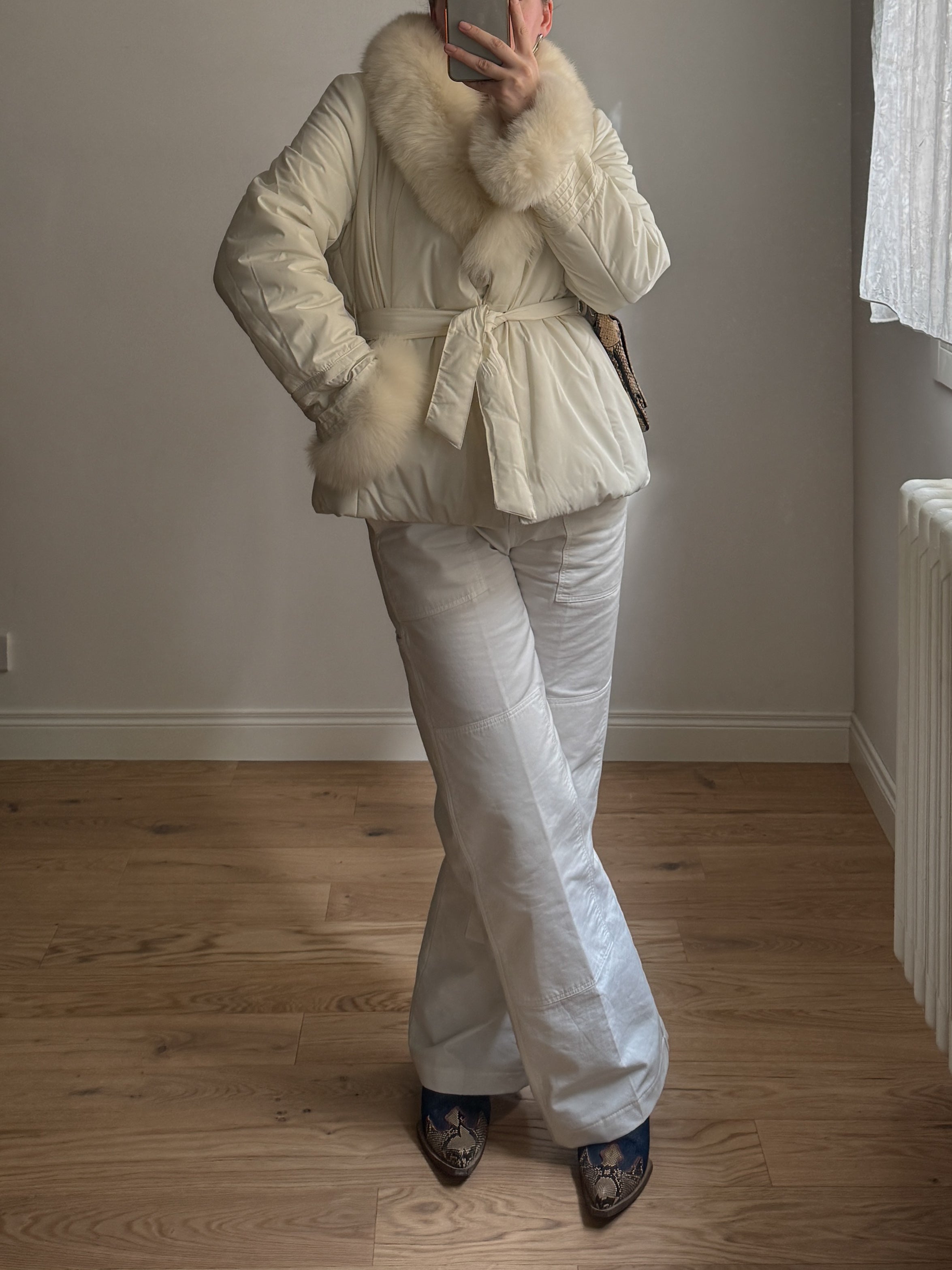 Padded jacket with real fur details