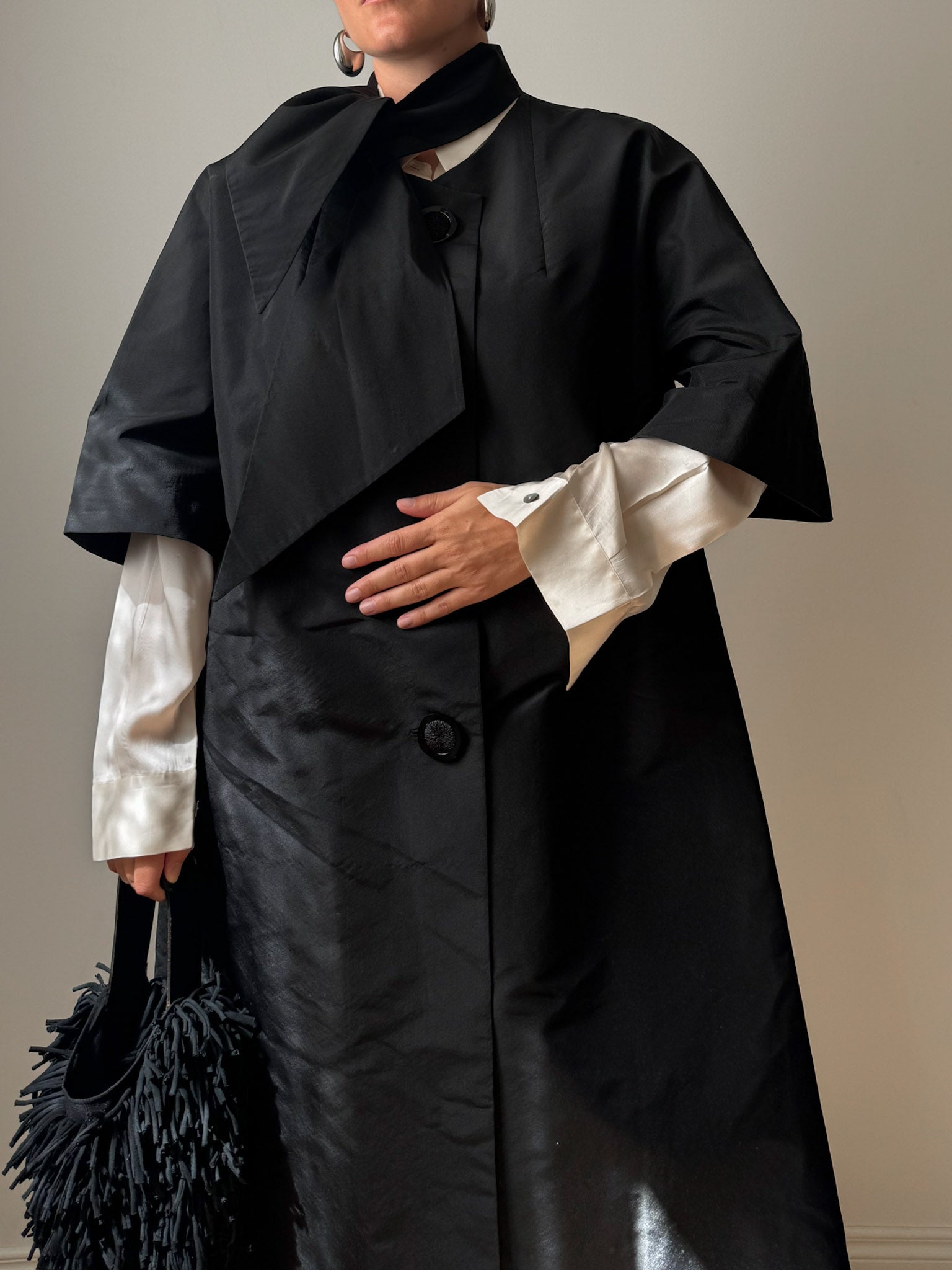 Tailored black dust coat