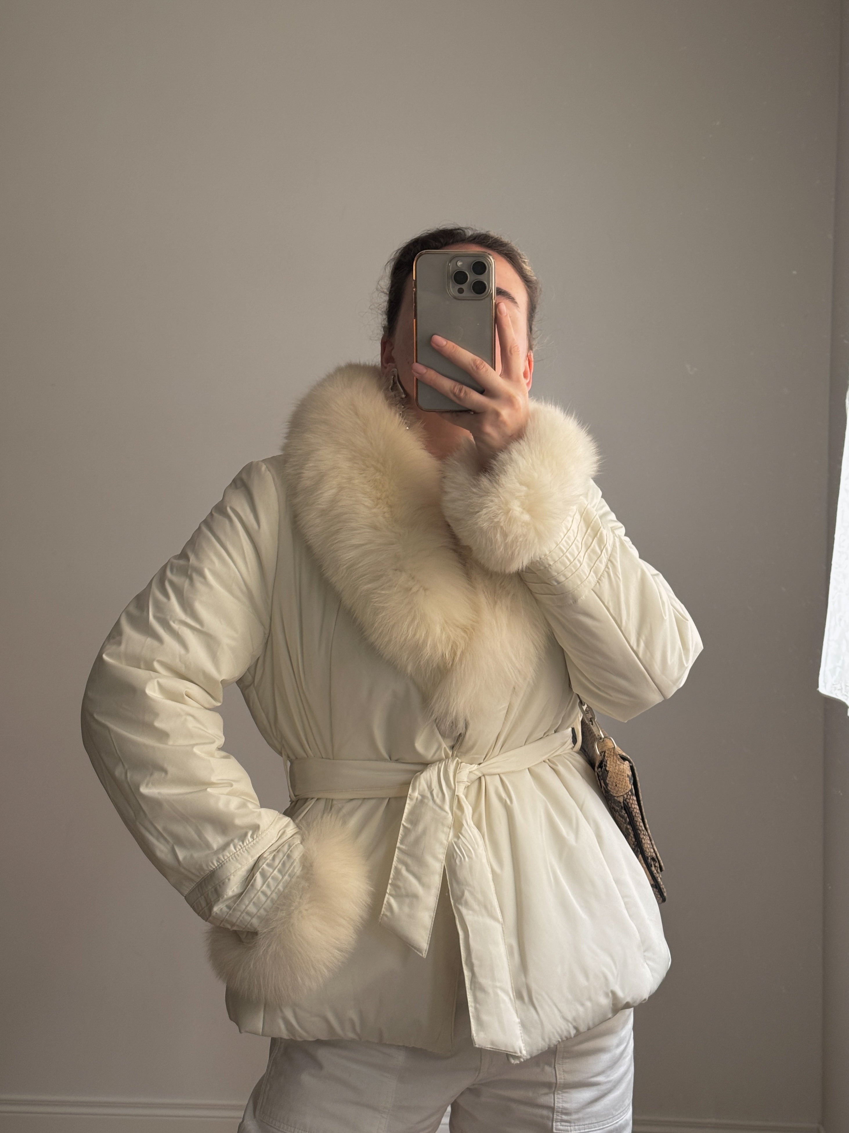 Padded jacket with real fur details