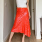 Sequins orange midi skirt