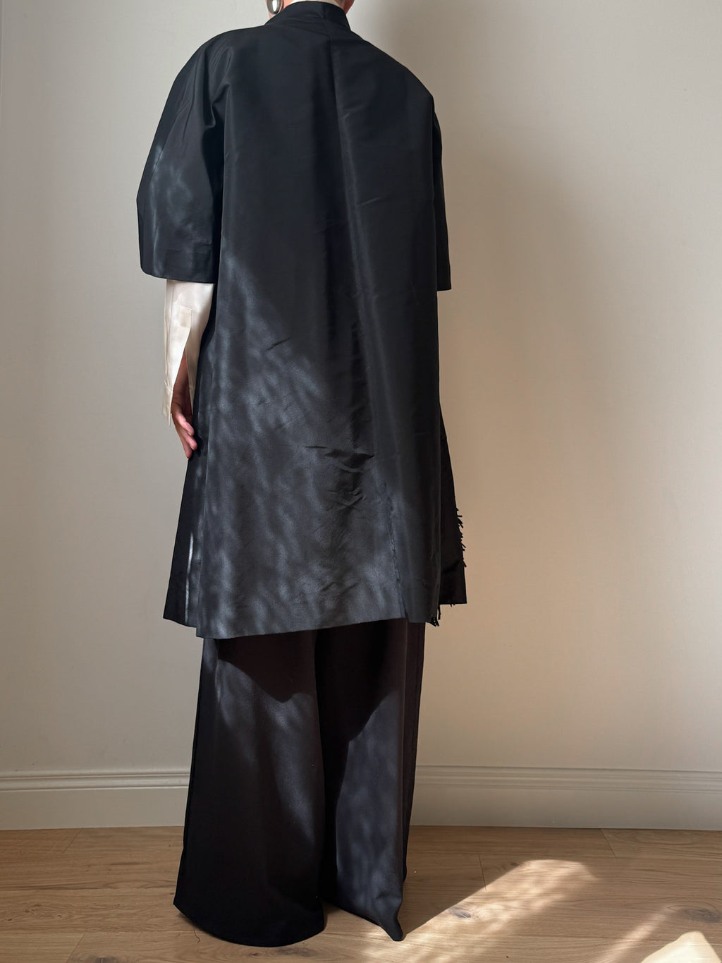 Tailored black dust coat
