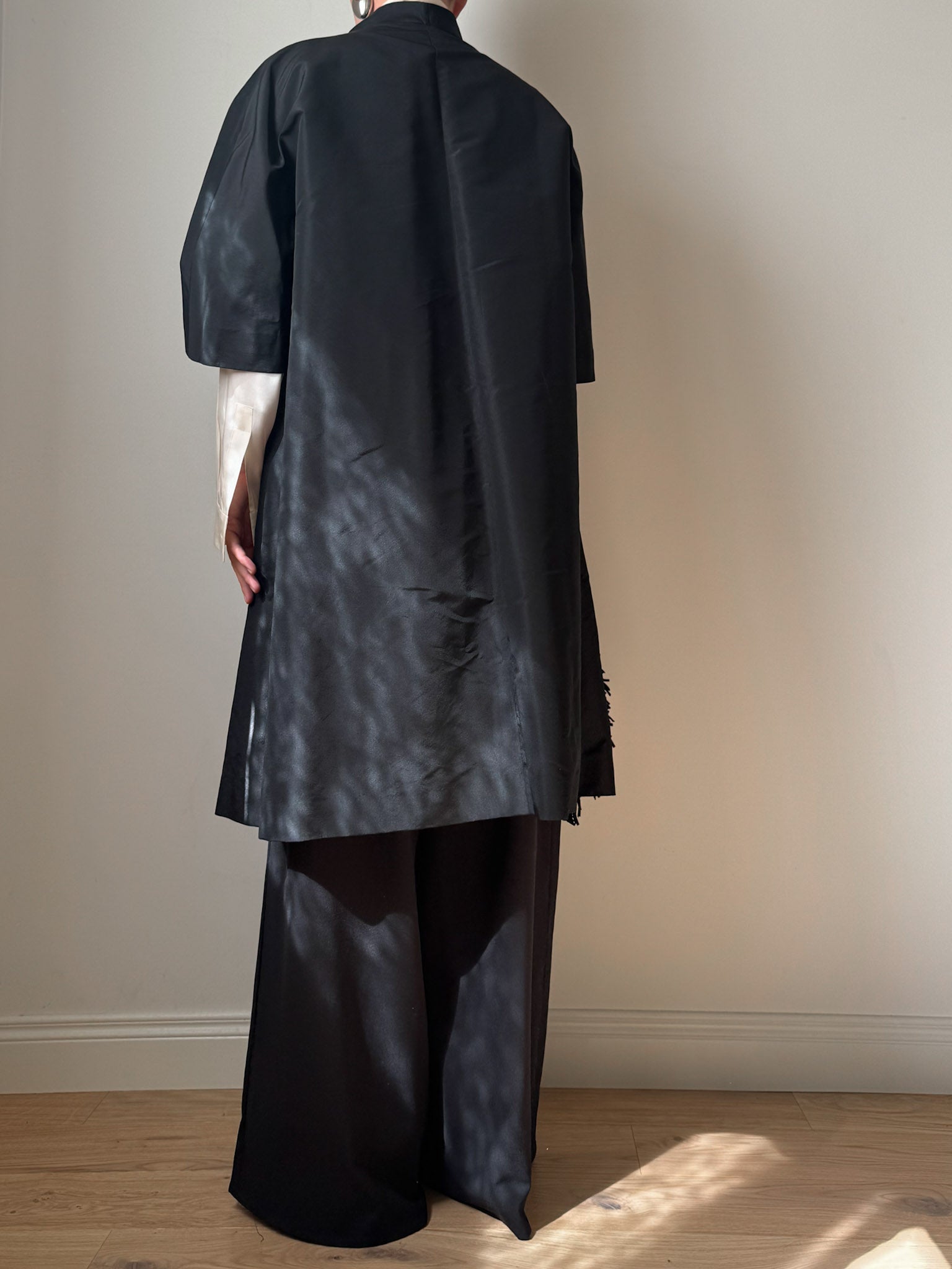 Tailored black dust coat