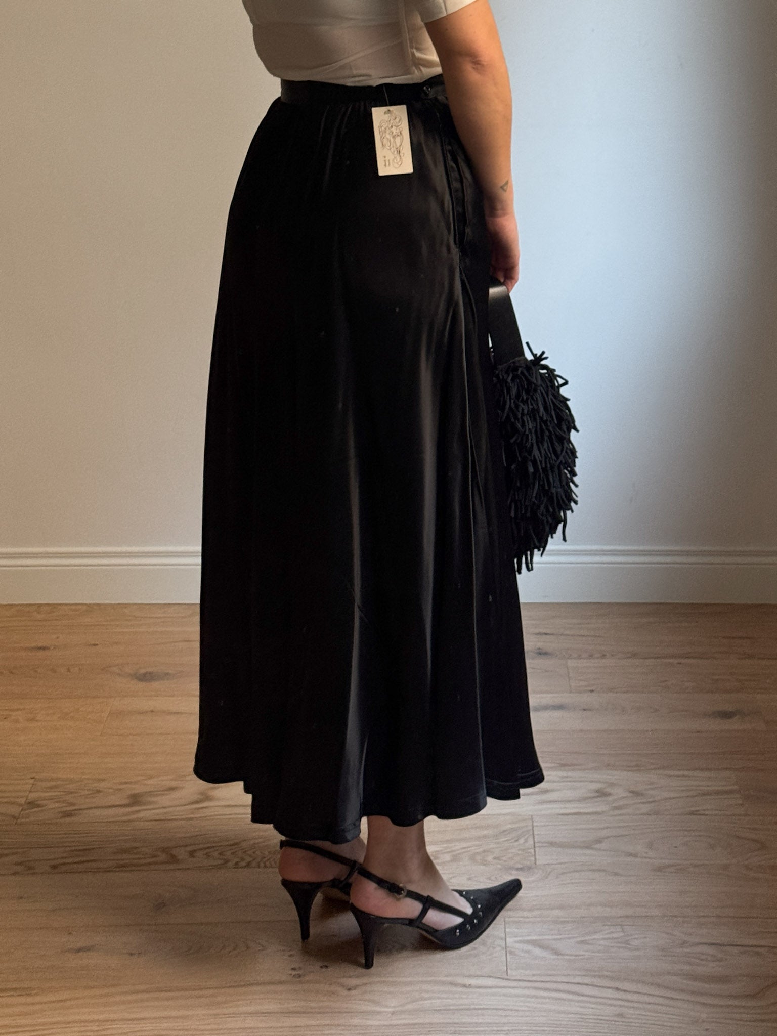 Satin-finish black skirt