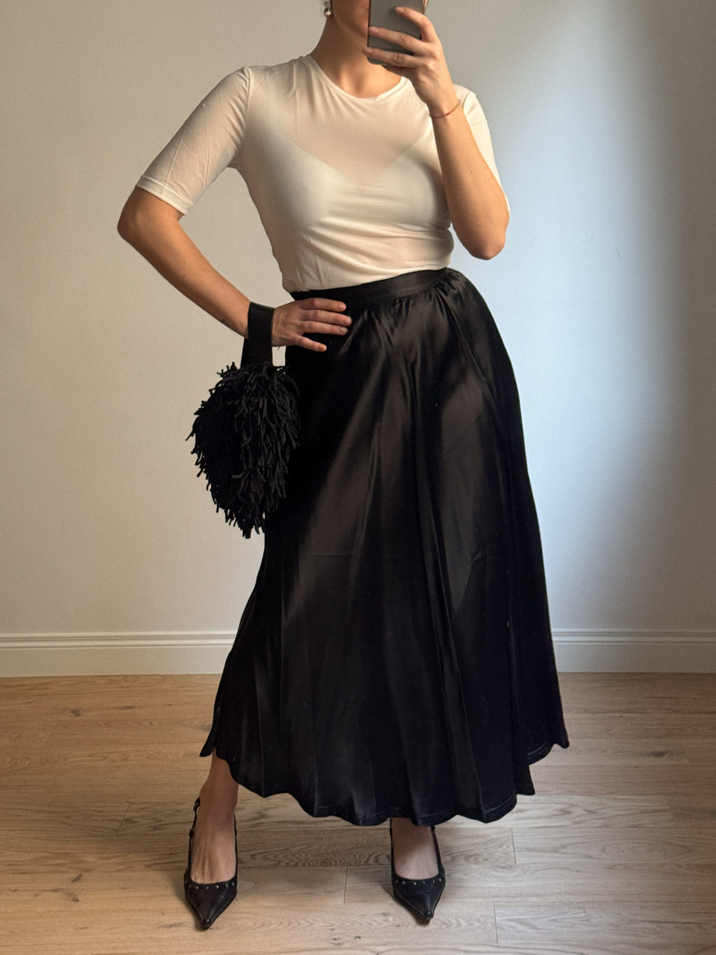 Satin-finish black skirt