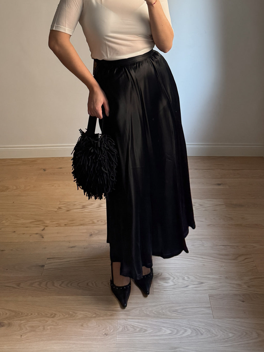 Satin-finish black skirt