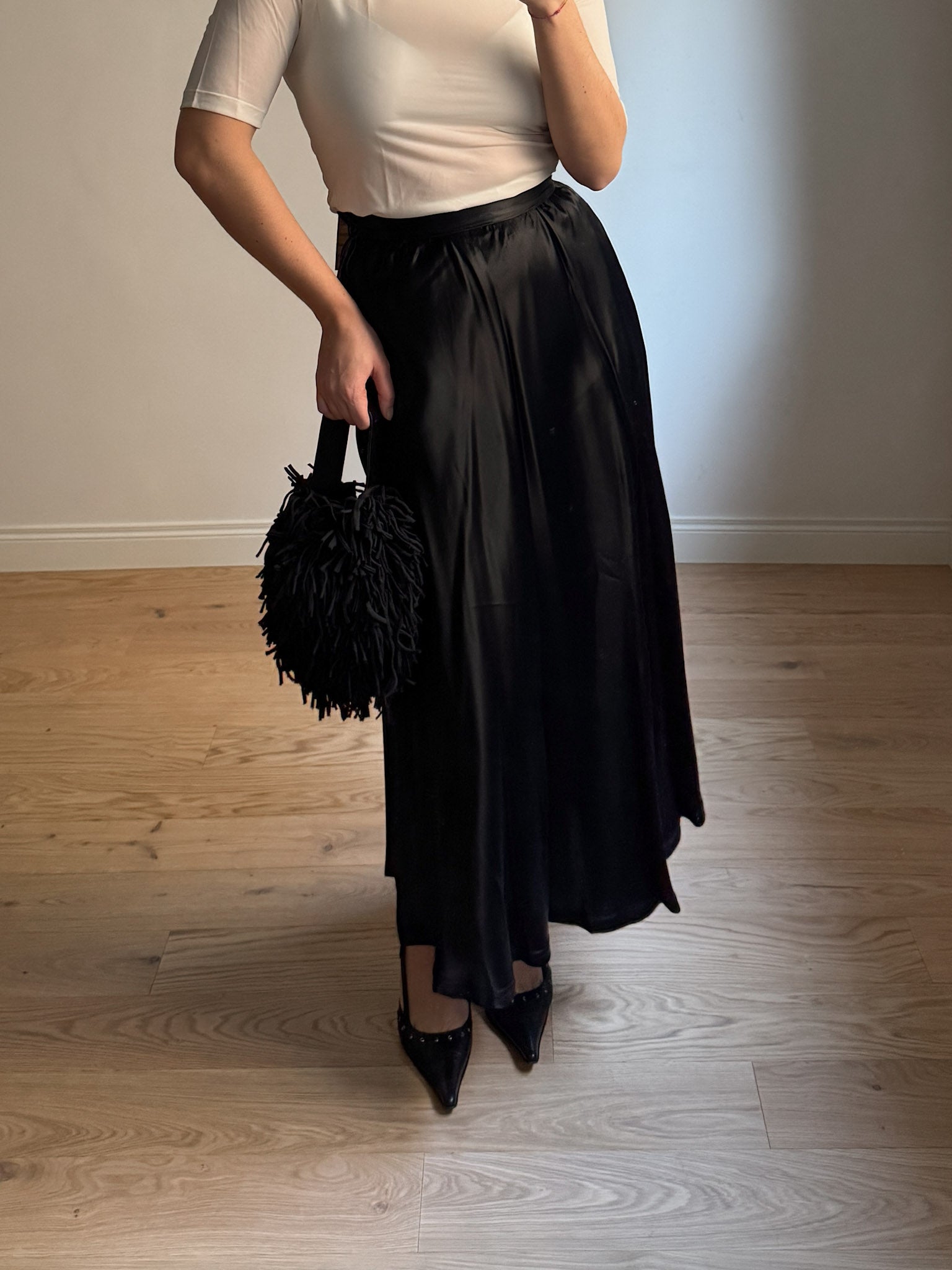 Satin-finish black skirt