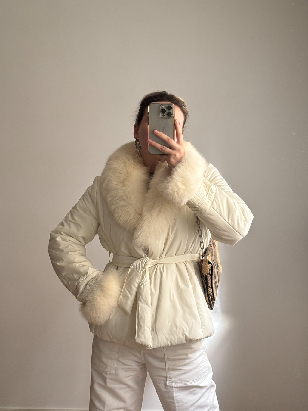 Padded jacket with real fur details