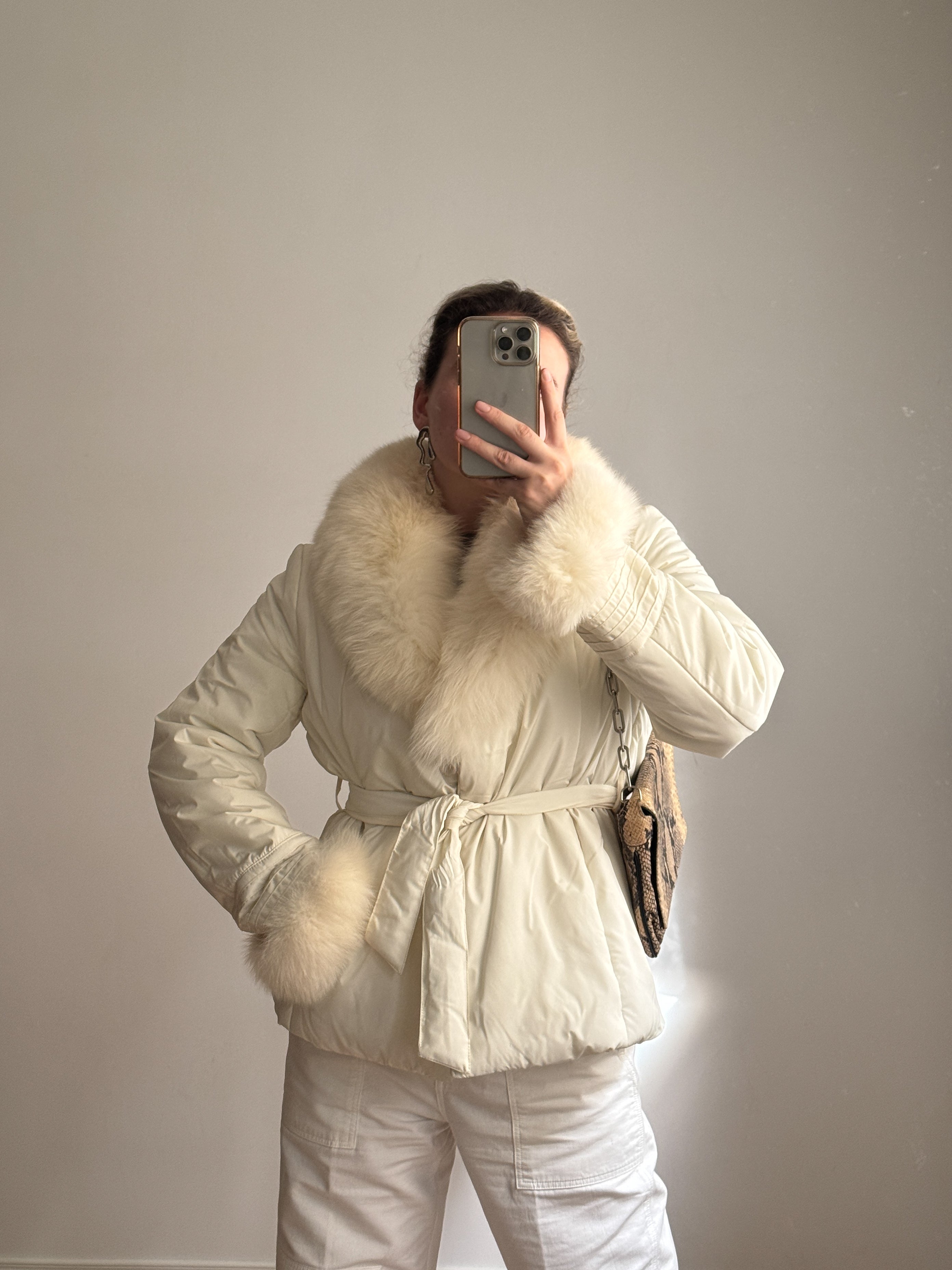 Padded jacket with real fur details