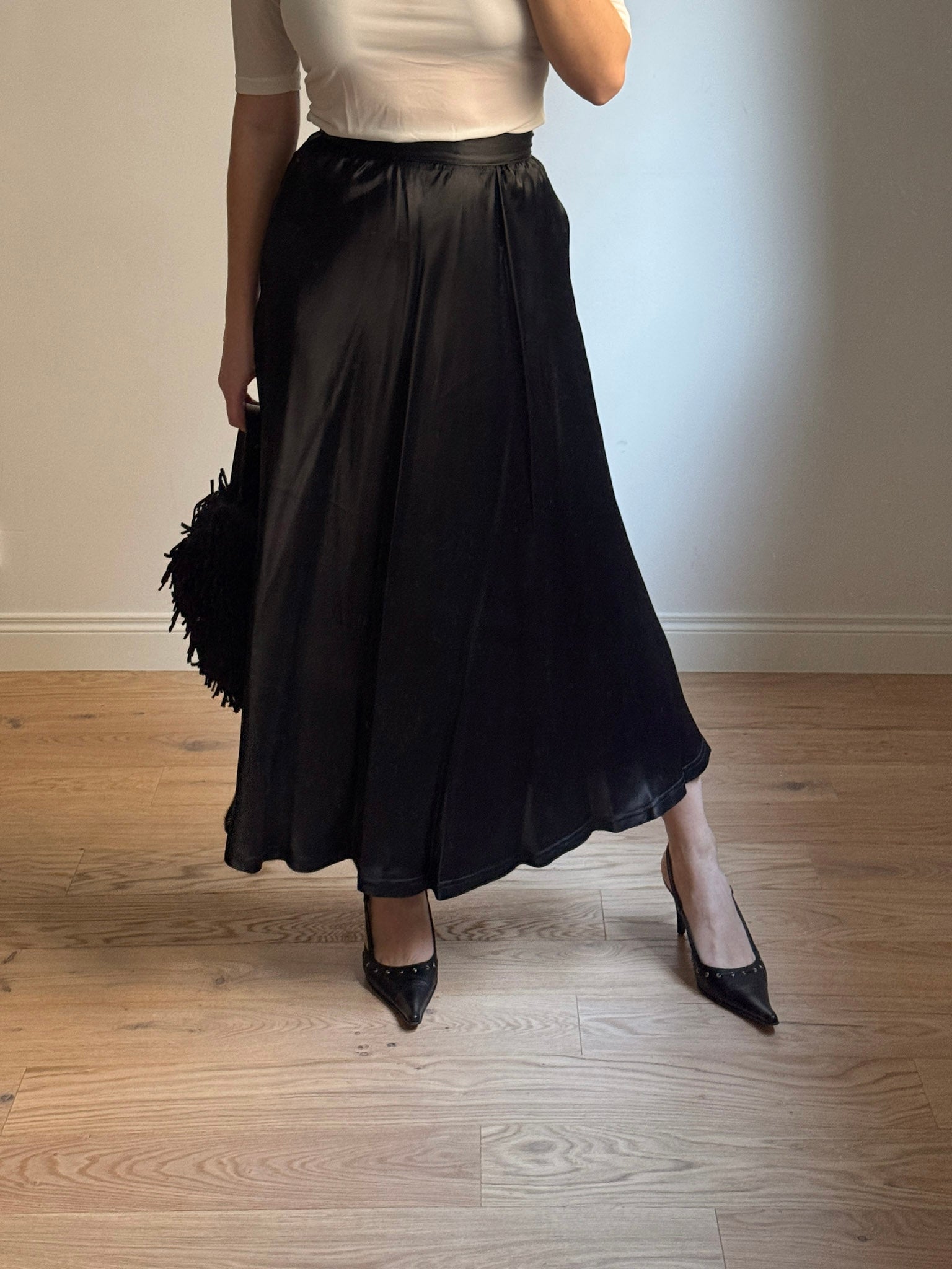 Satin-finish black skirt