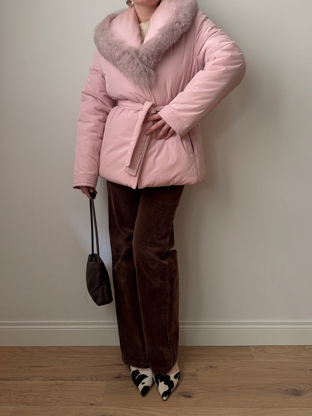 Padded jacket with real fur details