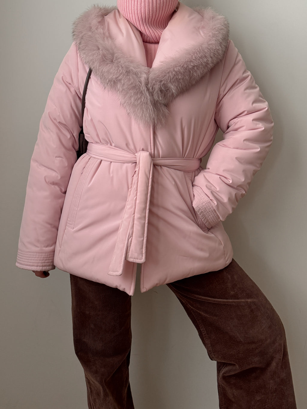 Padded jacket with real fur details