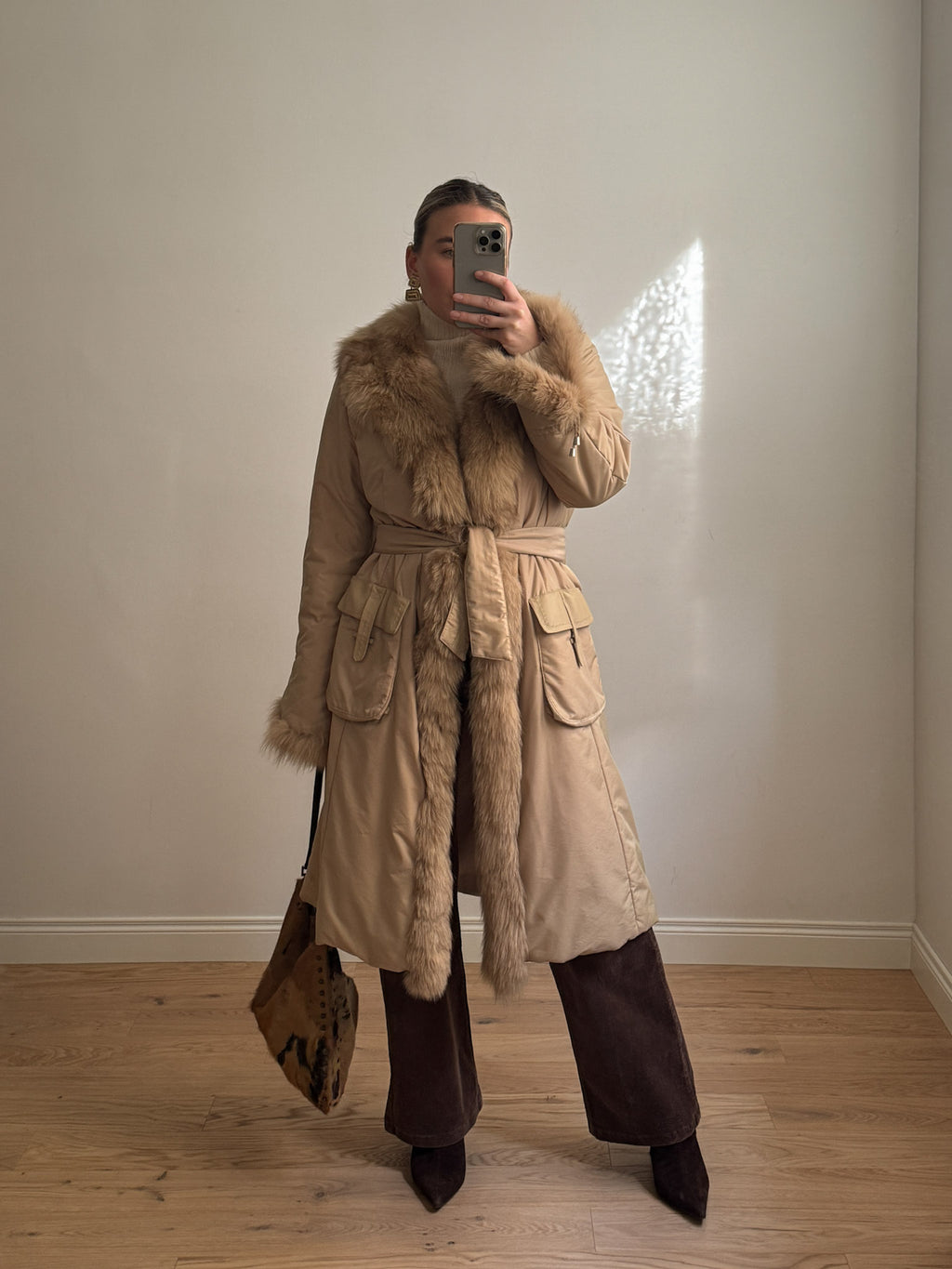 Padded coat with real fur details