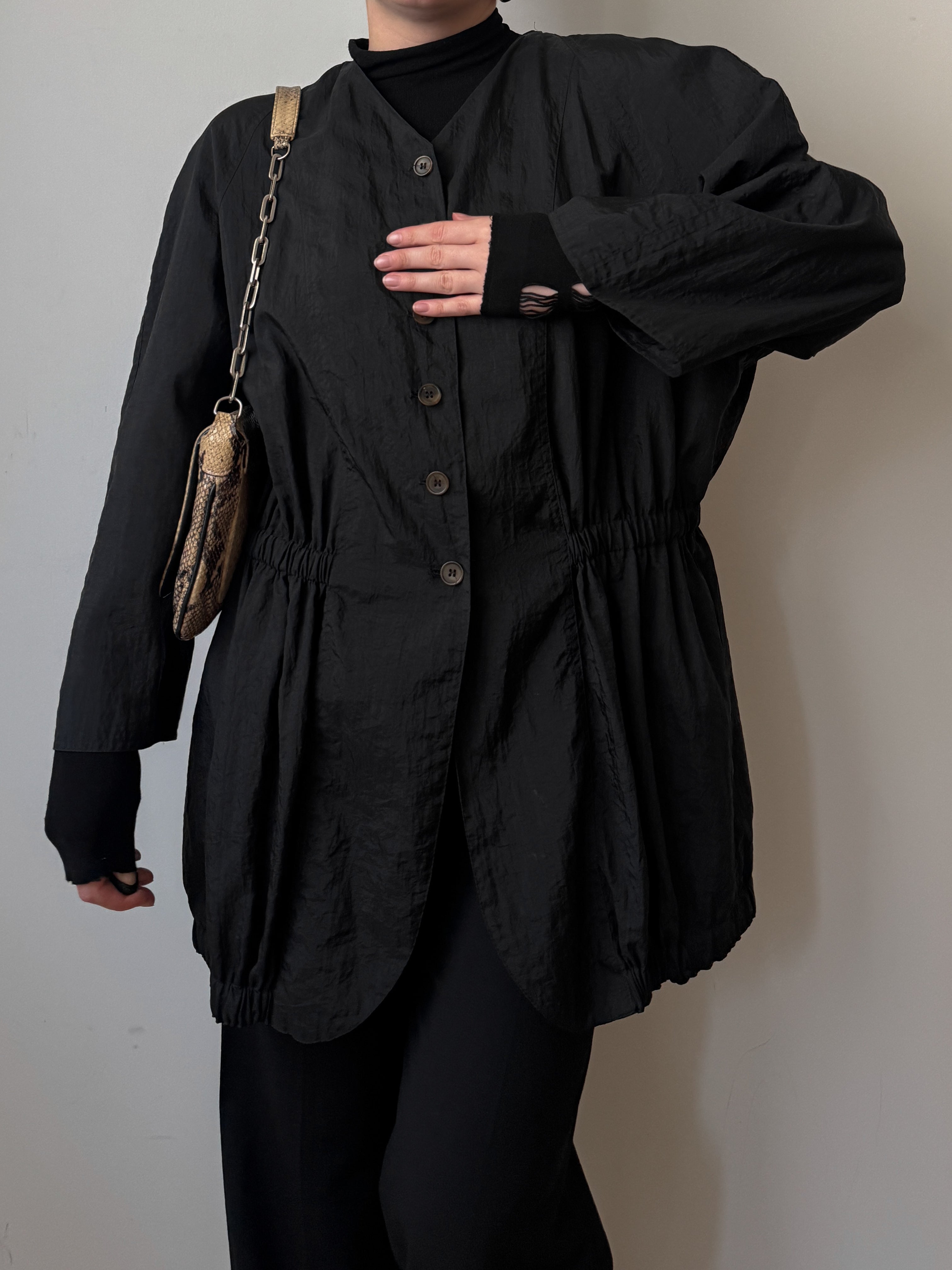 Black jacket with gathered waist