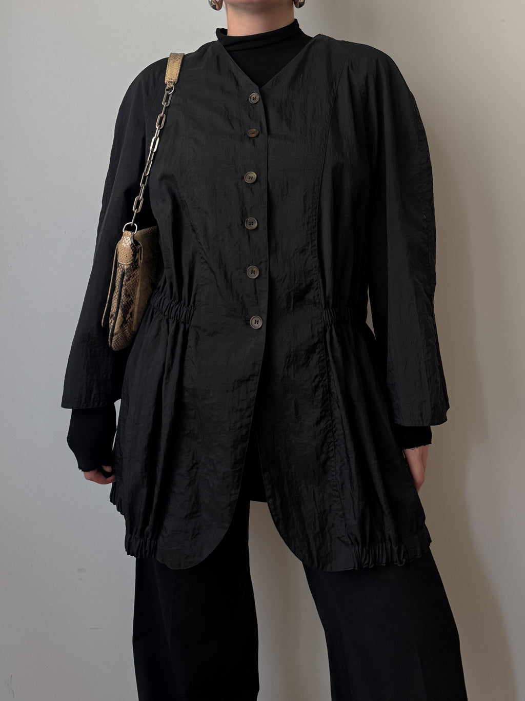Black jacket with gathered waist
