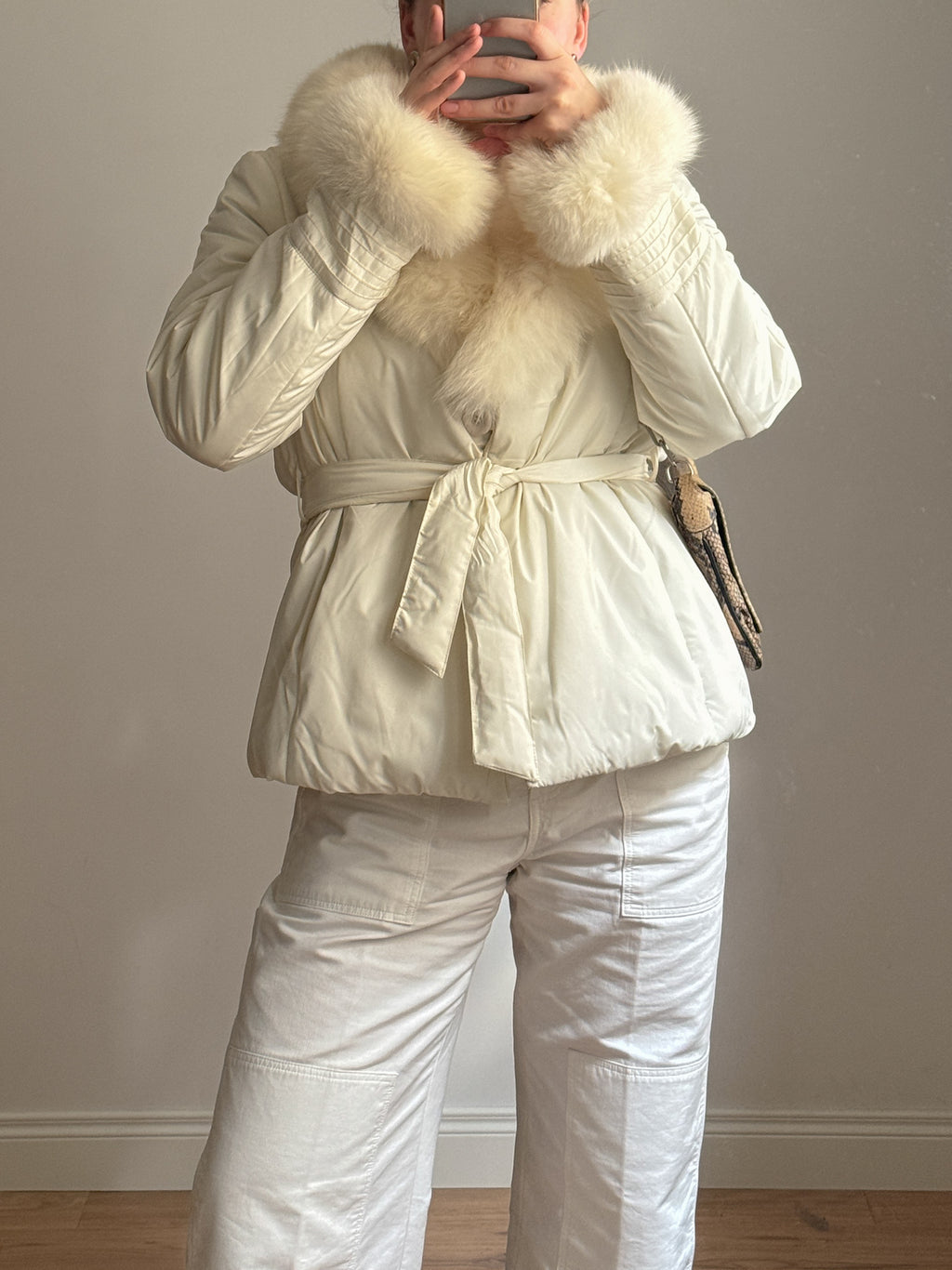 Padded jacket with real fur details
