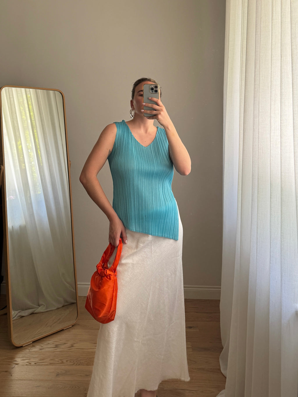 Top plissettato asimmetrico azzurro