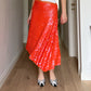 Sequins orange midi skirt