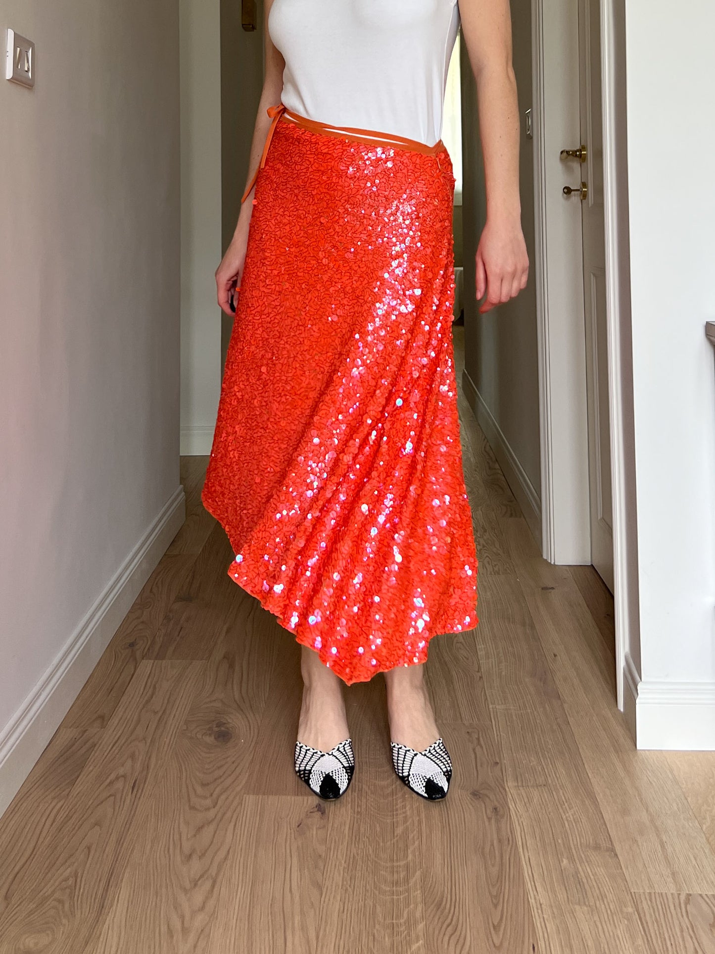 Sequins orange midi skirt