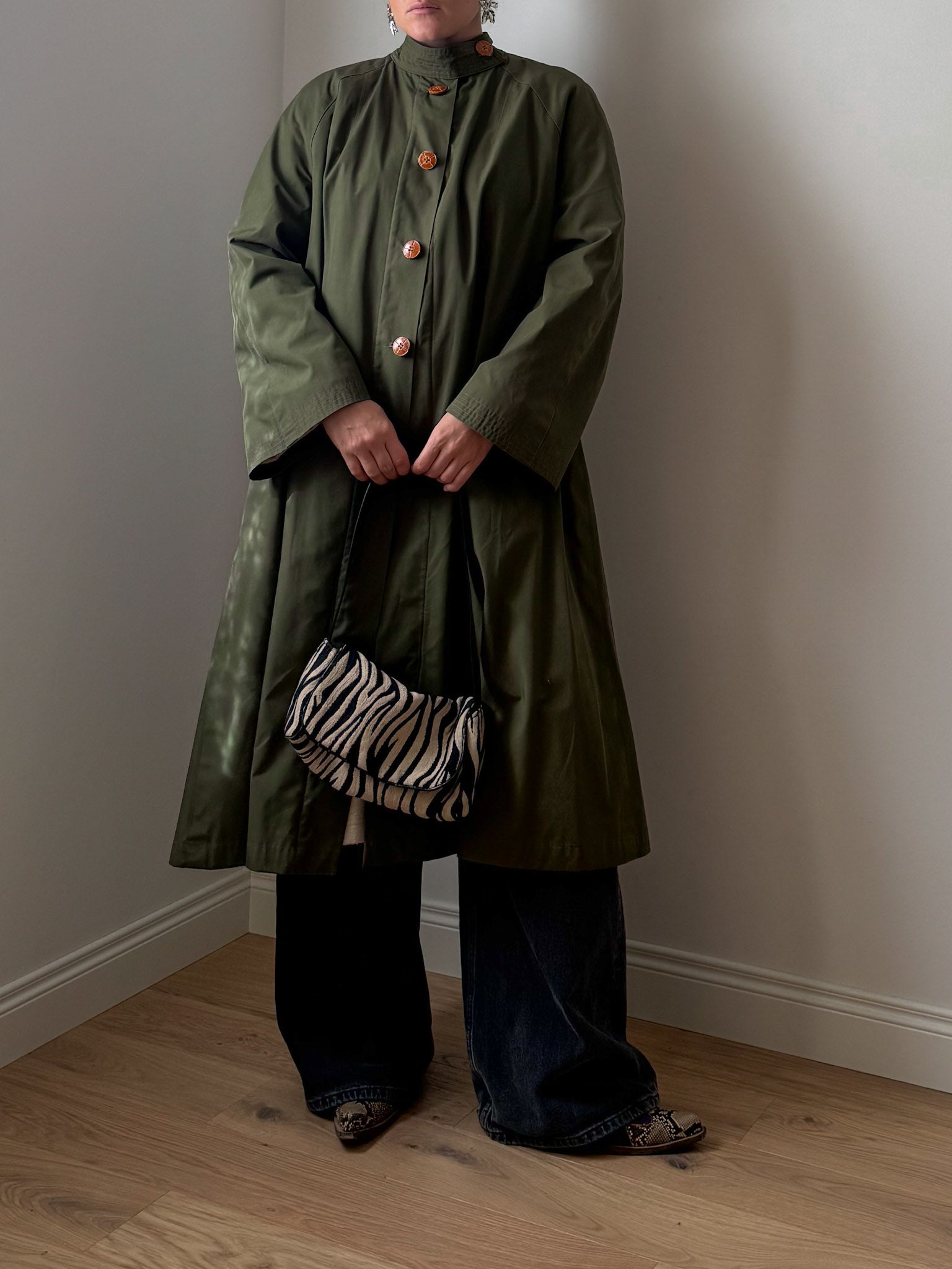 Green quilted-lined trench coat