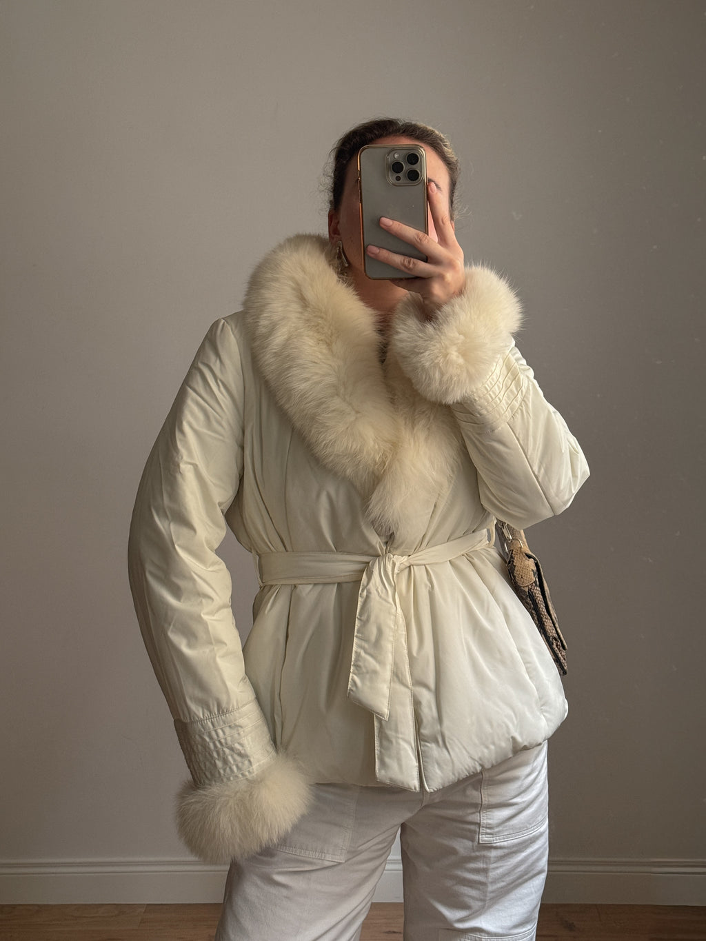 Padded jacket with real fur details