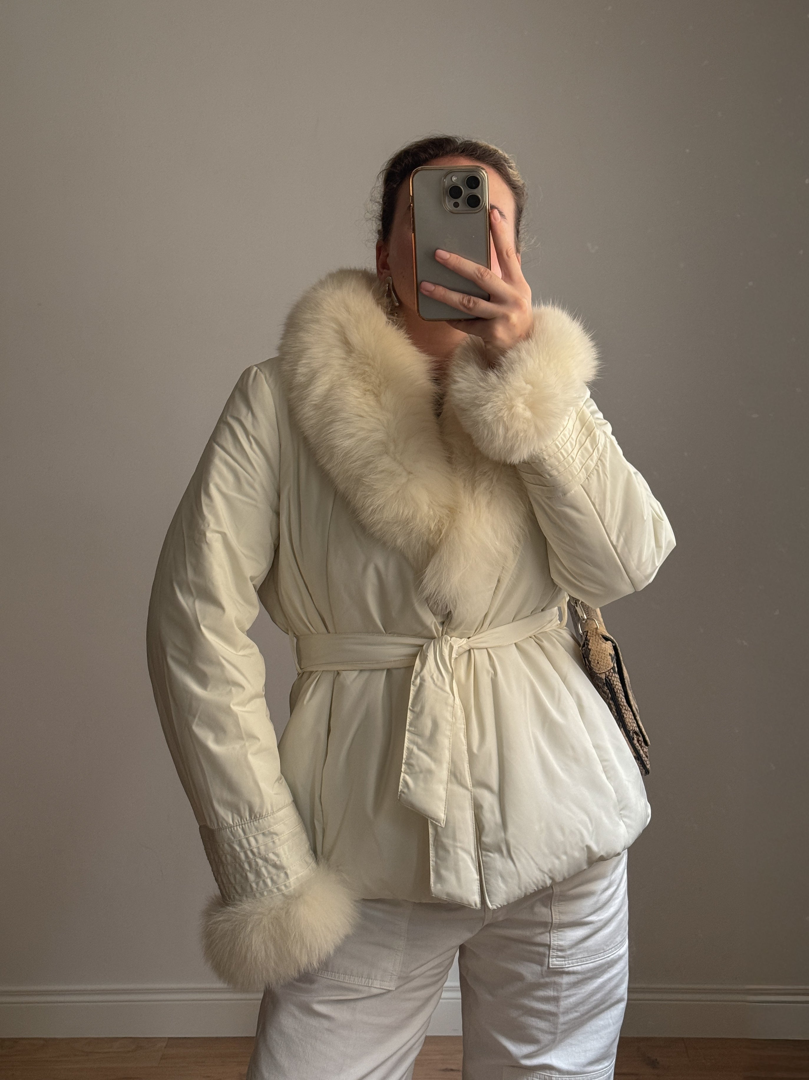 Padded jacket with real fur details