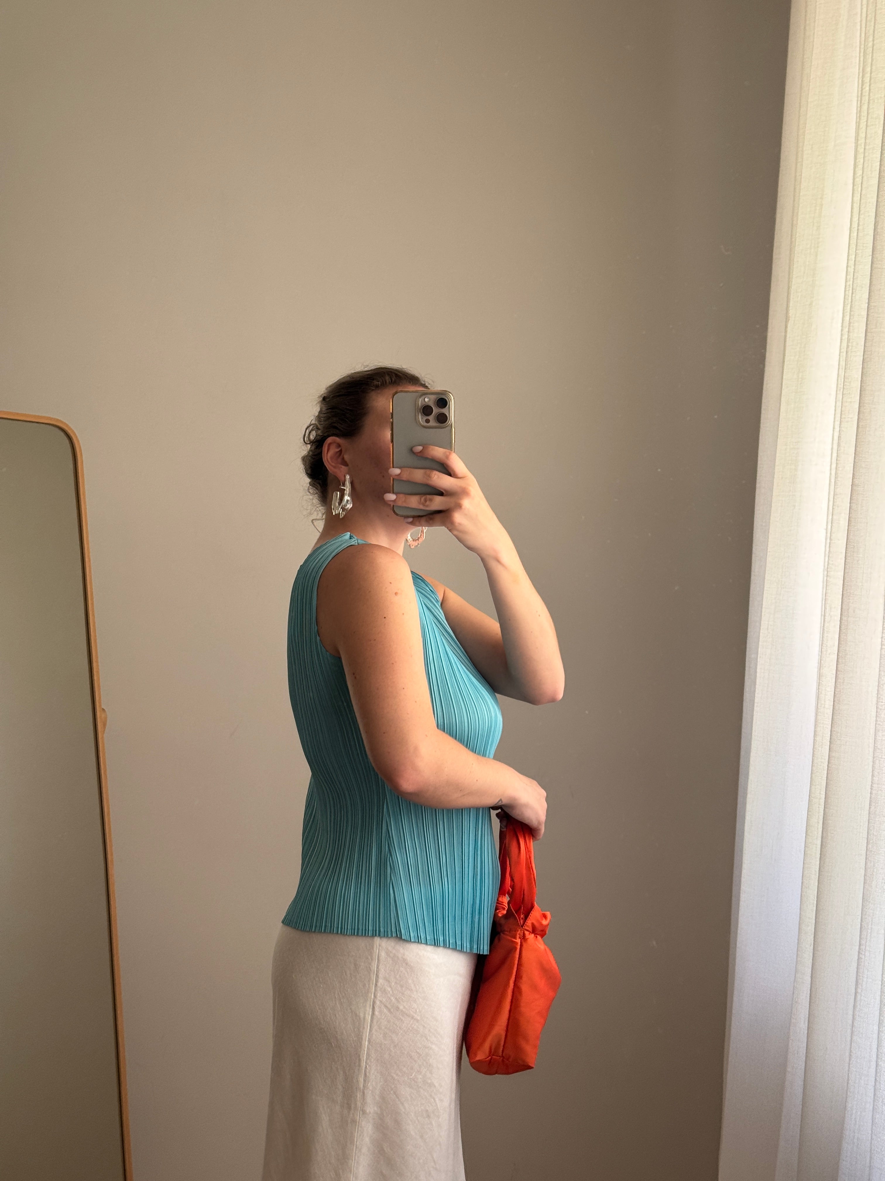 Top plissettato asimmetrico azzurro