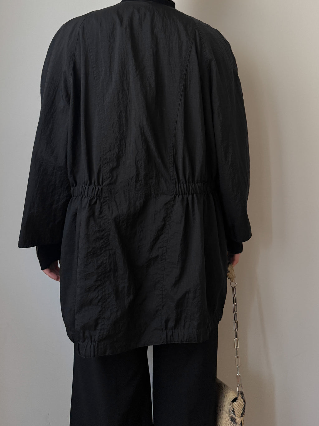 Black jacket with gathered waist