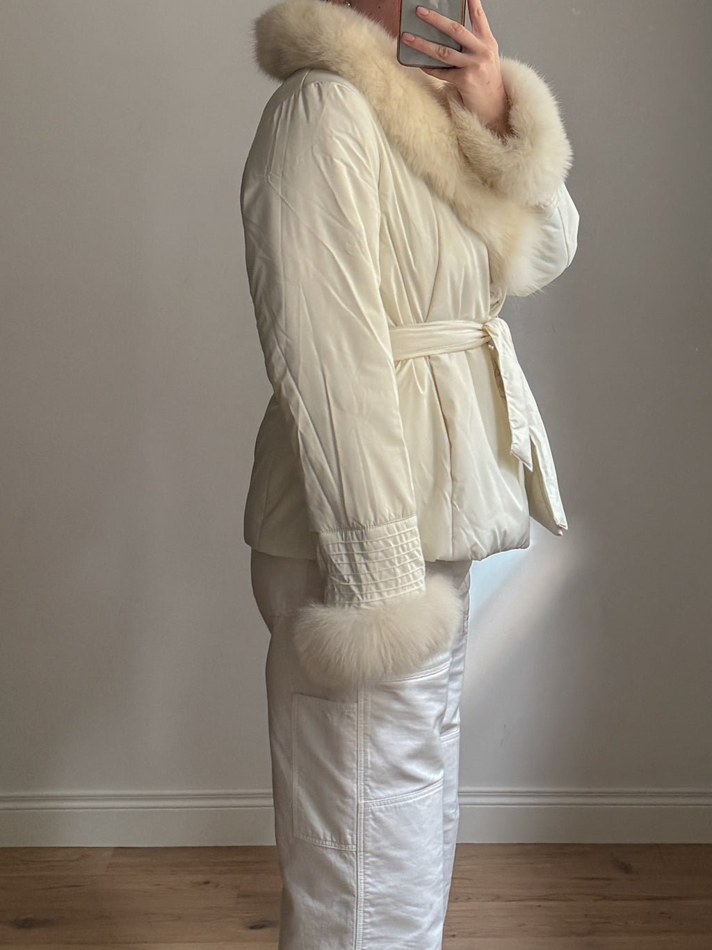Padded jacket with real fur details