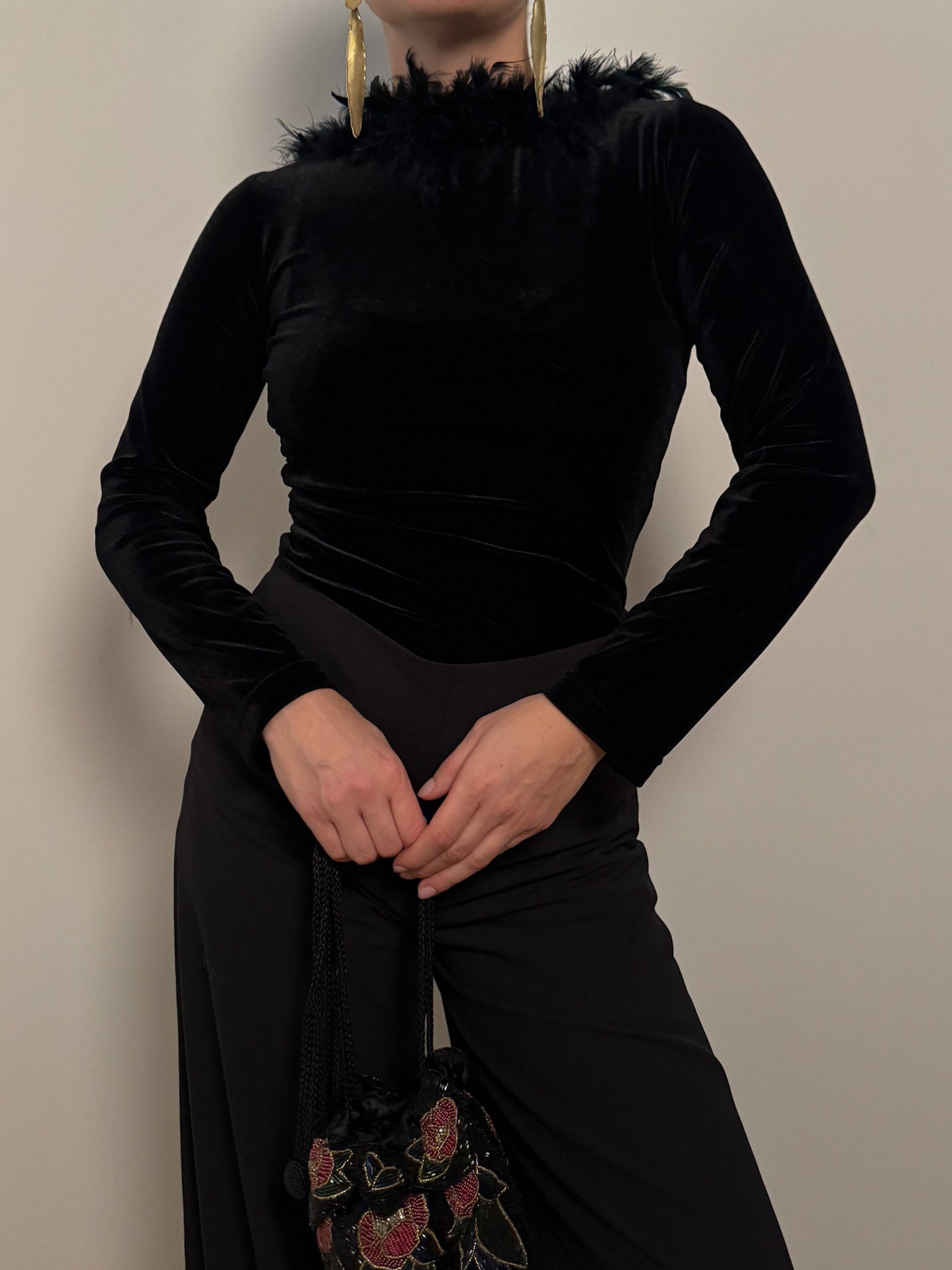 Velvet and feathers black top