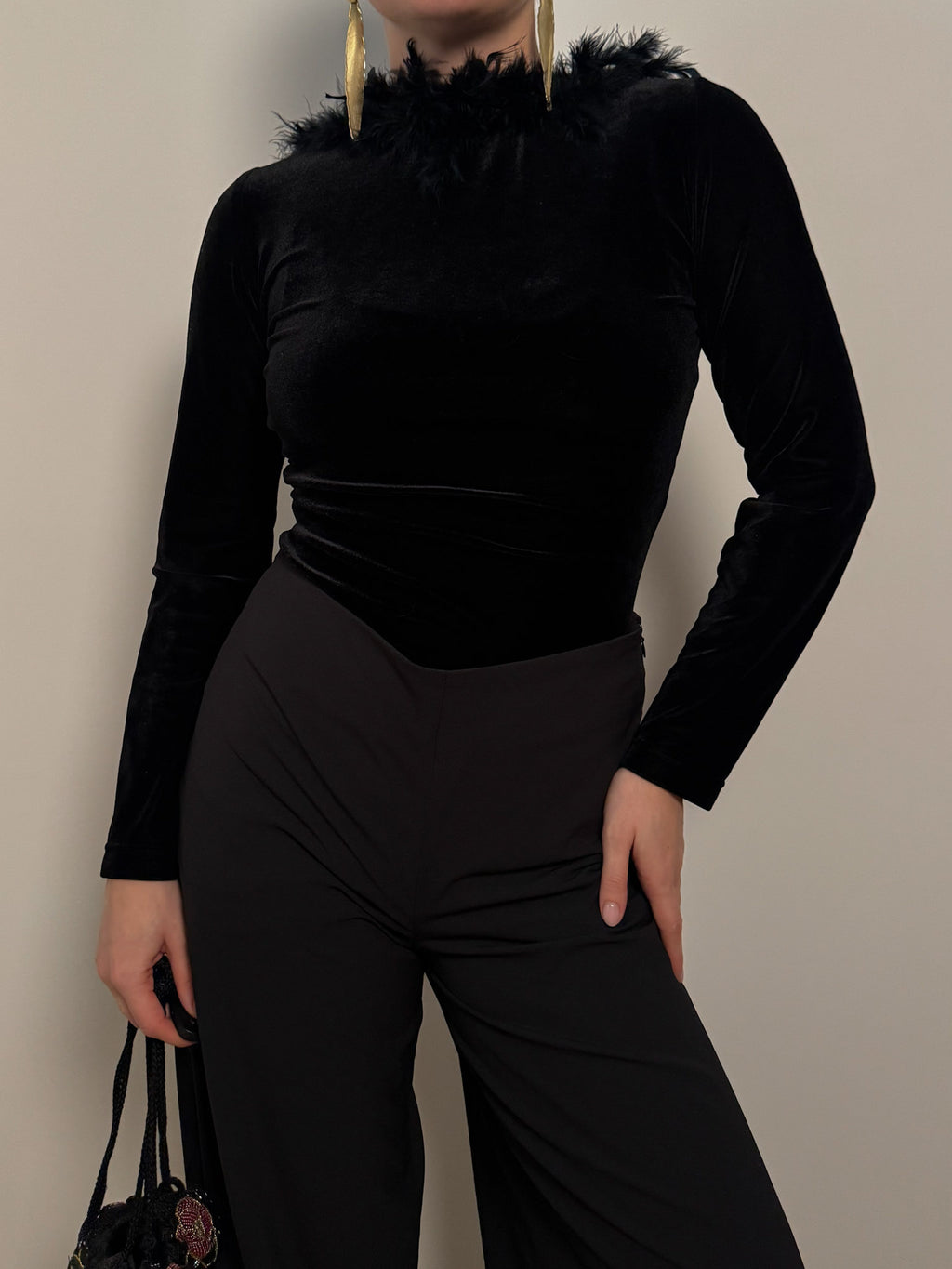 Velvet and feathers black top