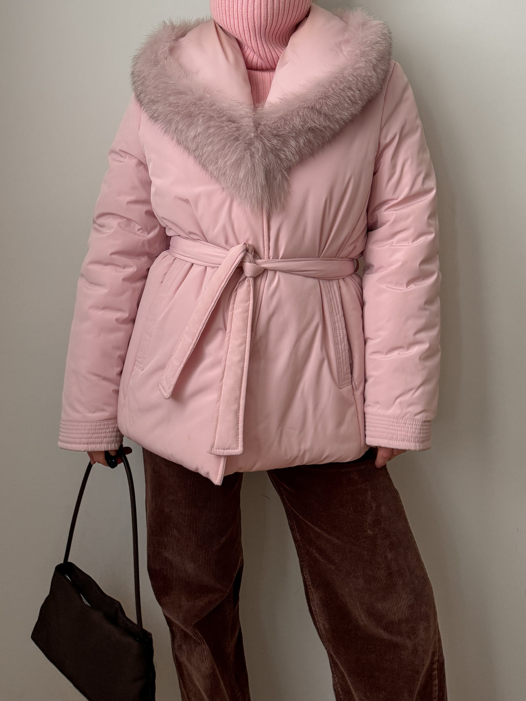 Padded jacket with real fur details
