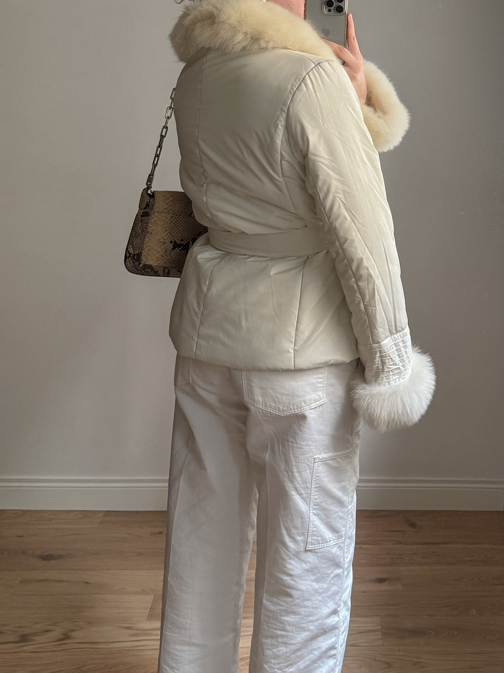 Padded jacket with real fur details