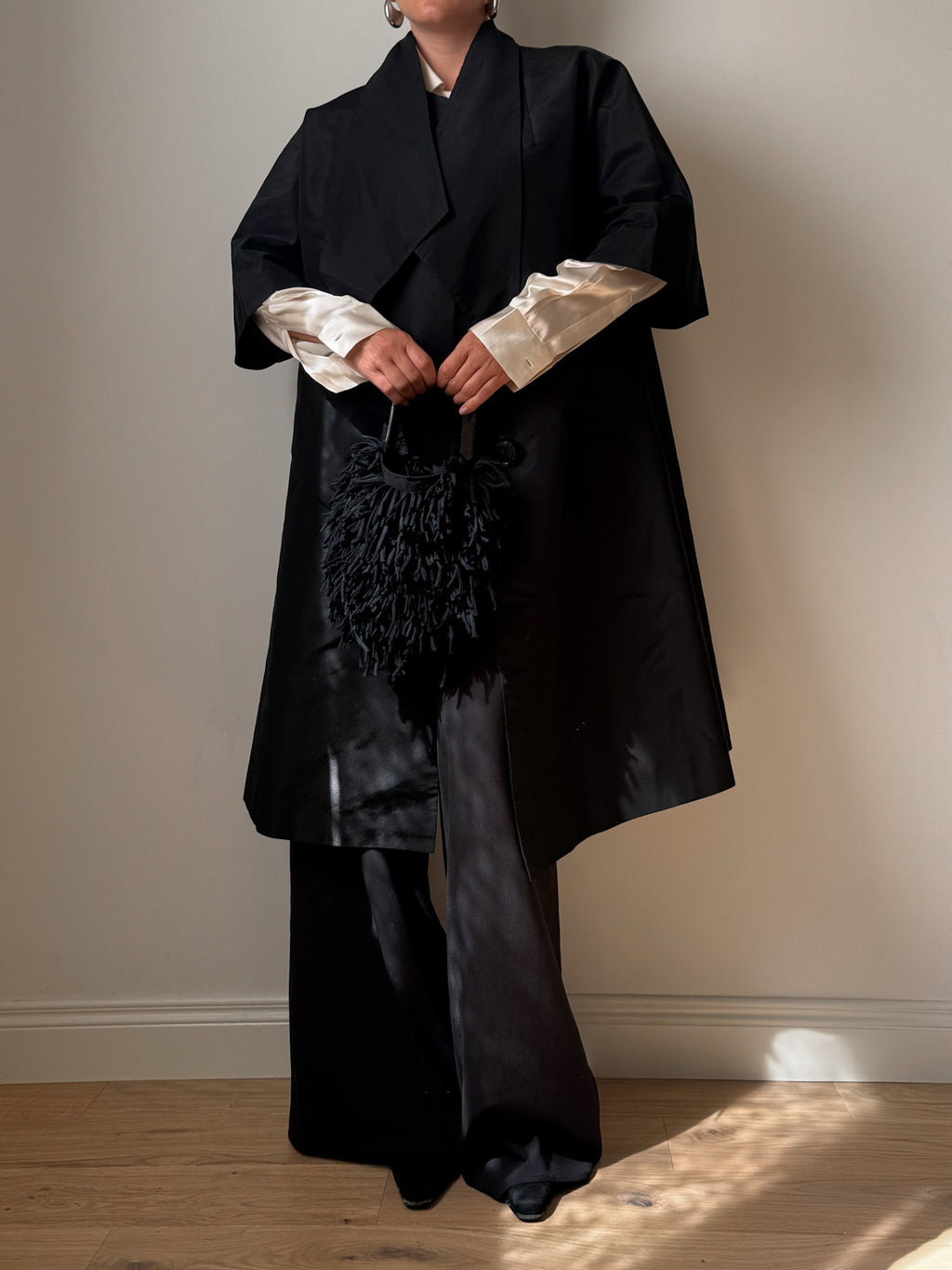 Tailored black dust coat