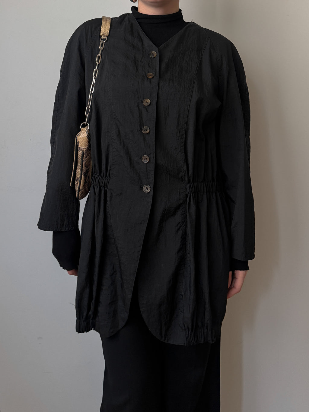 Black jacket with gathered waist