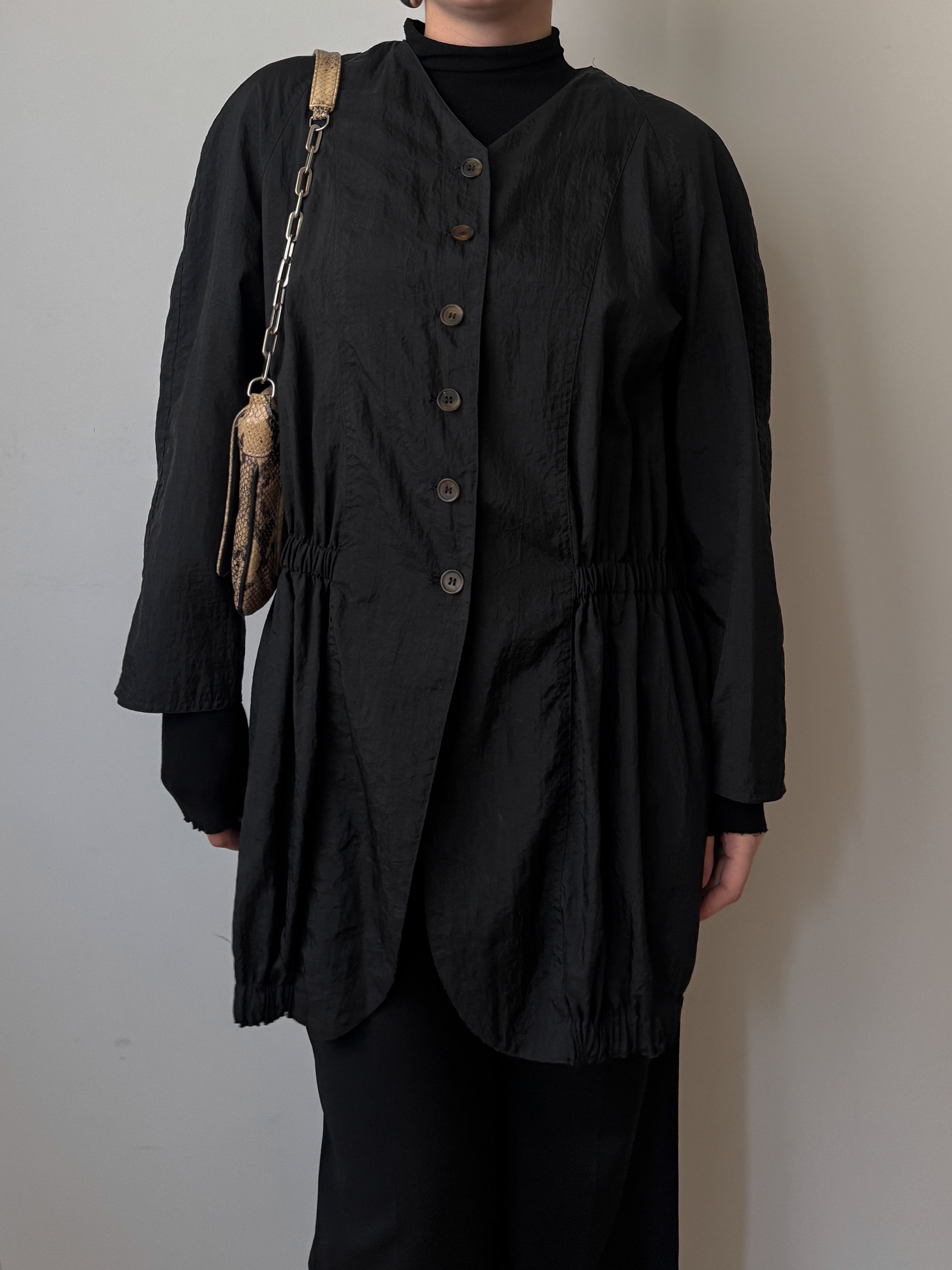 Black jacket with gathered waist