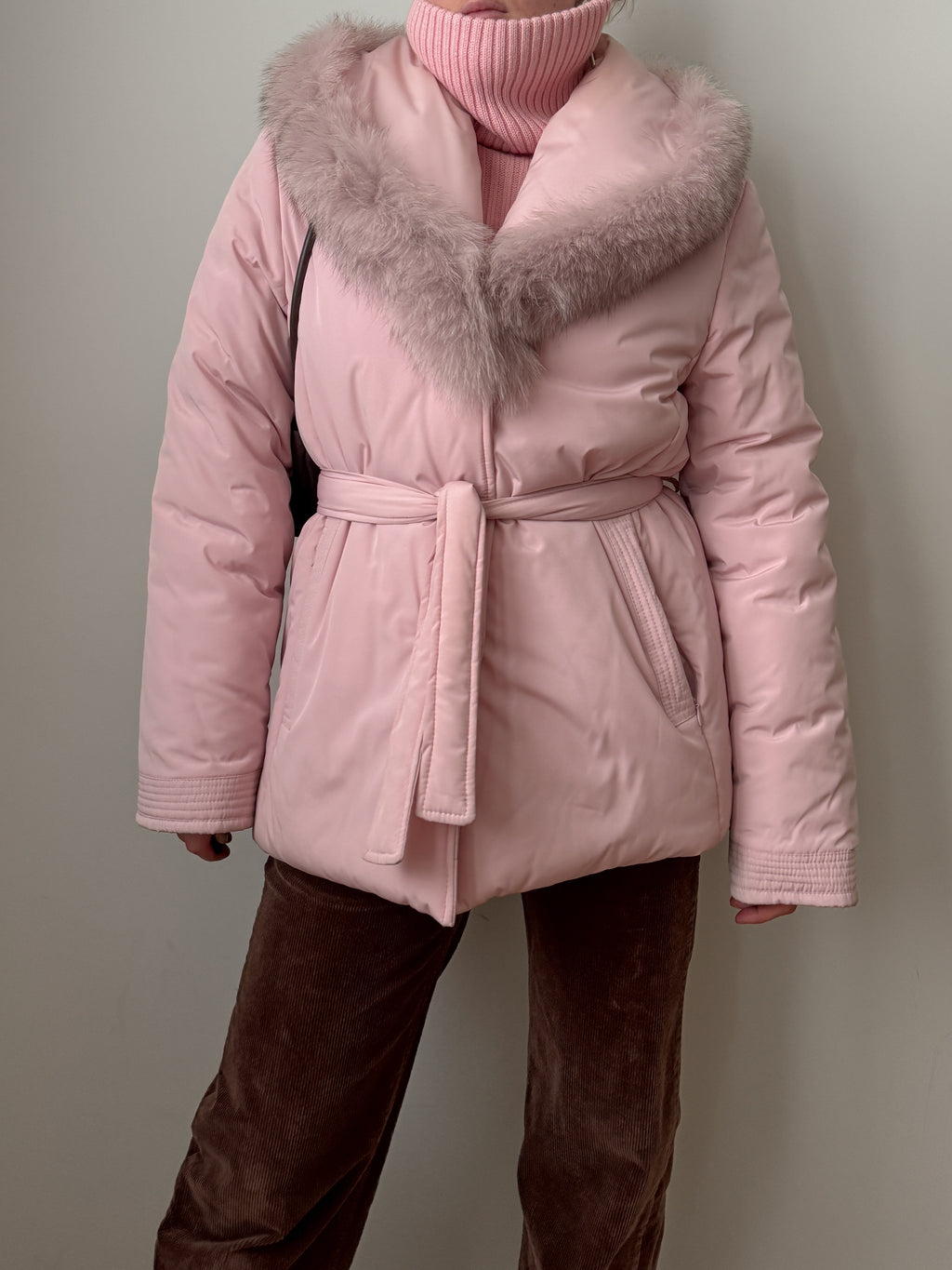Padded jacket with real fur details