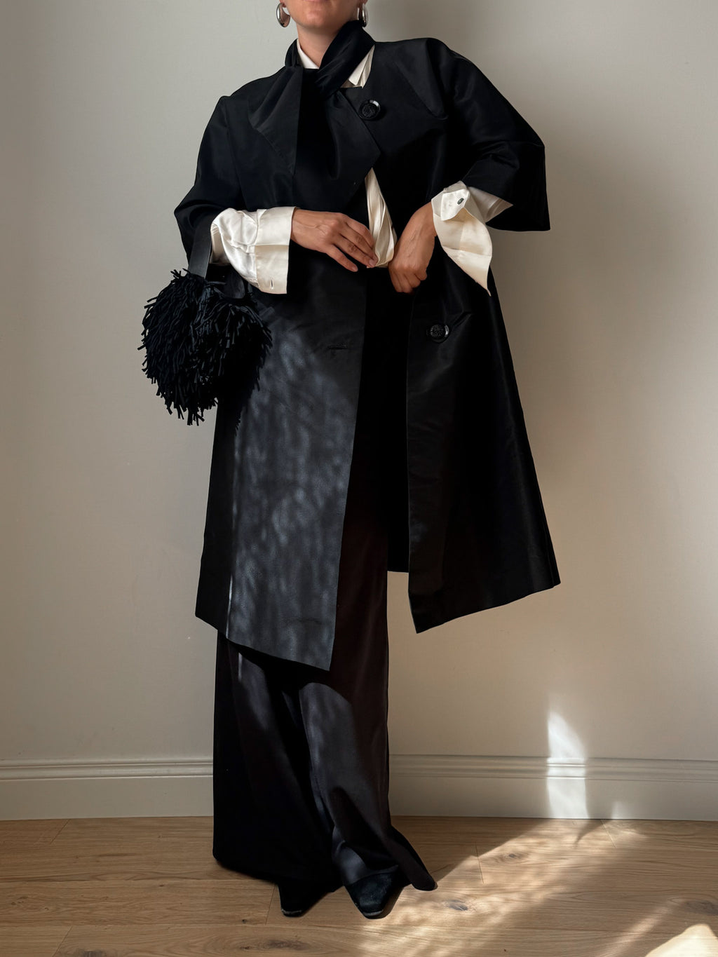 Tailored black dust coat