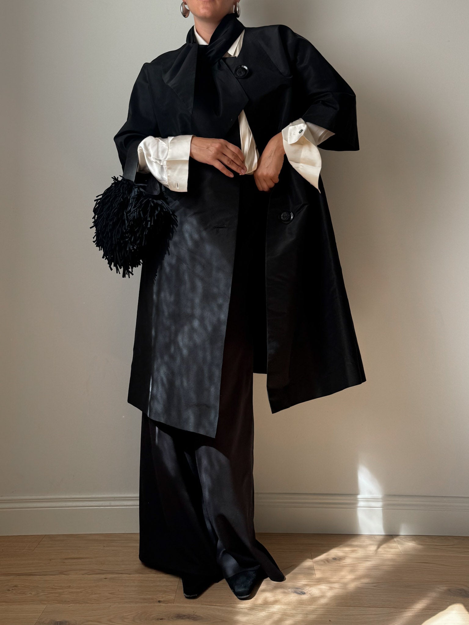 Tailored black dust coat