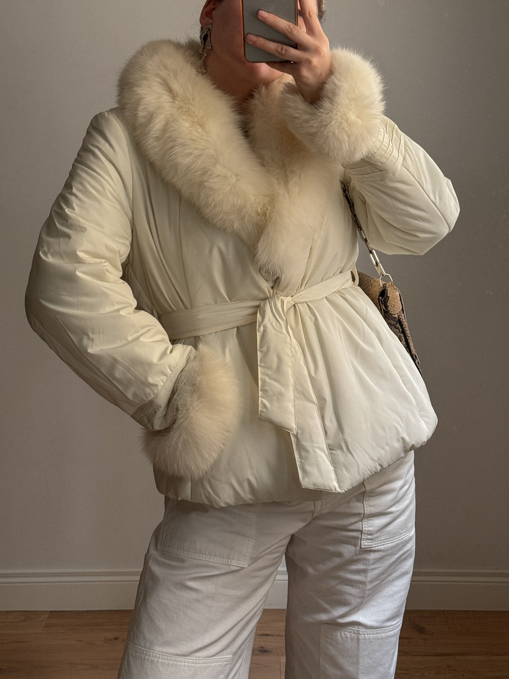 Padded jacket with real fur details