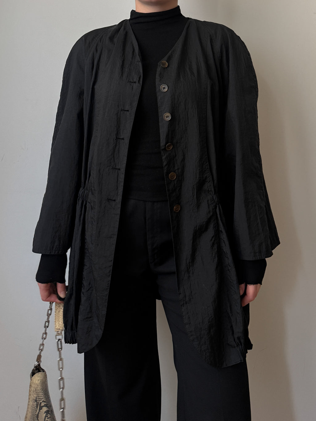 Black jacket with gathered waist