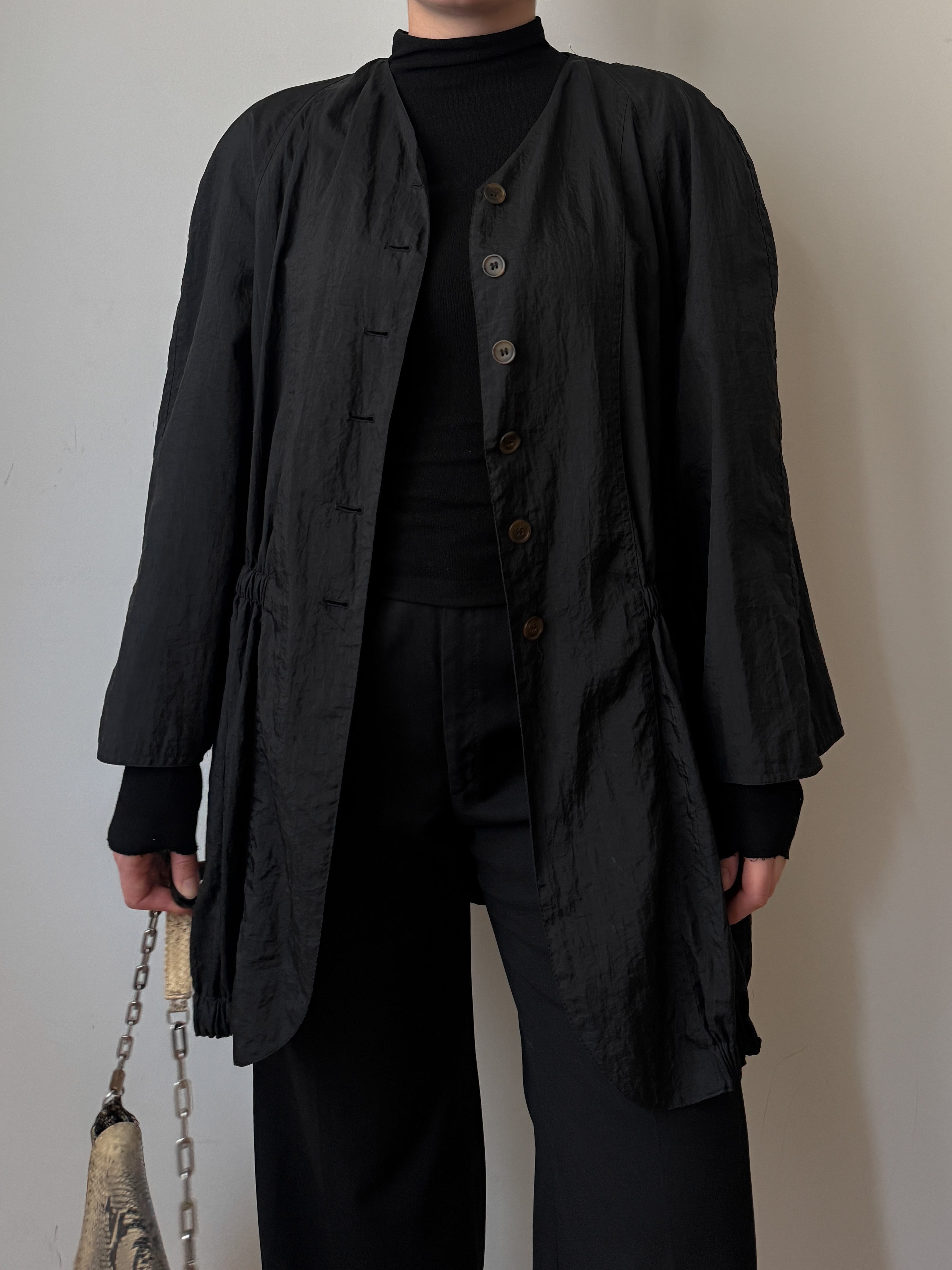 Black jacket with gathered waist